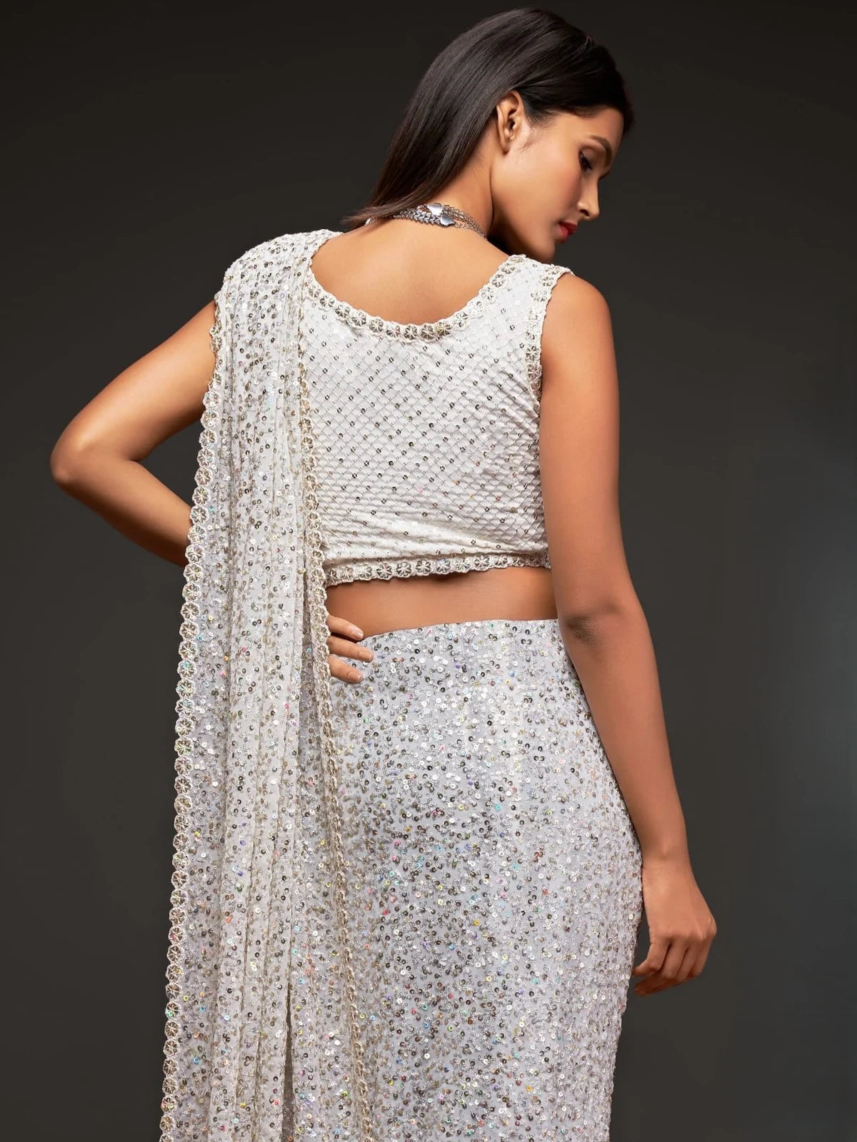 Tarani off white georgette saree back blouse view with sequins embroidery