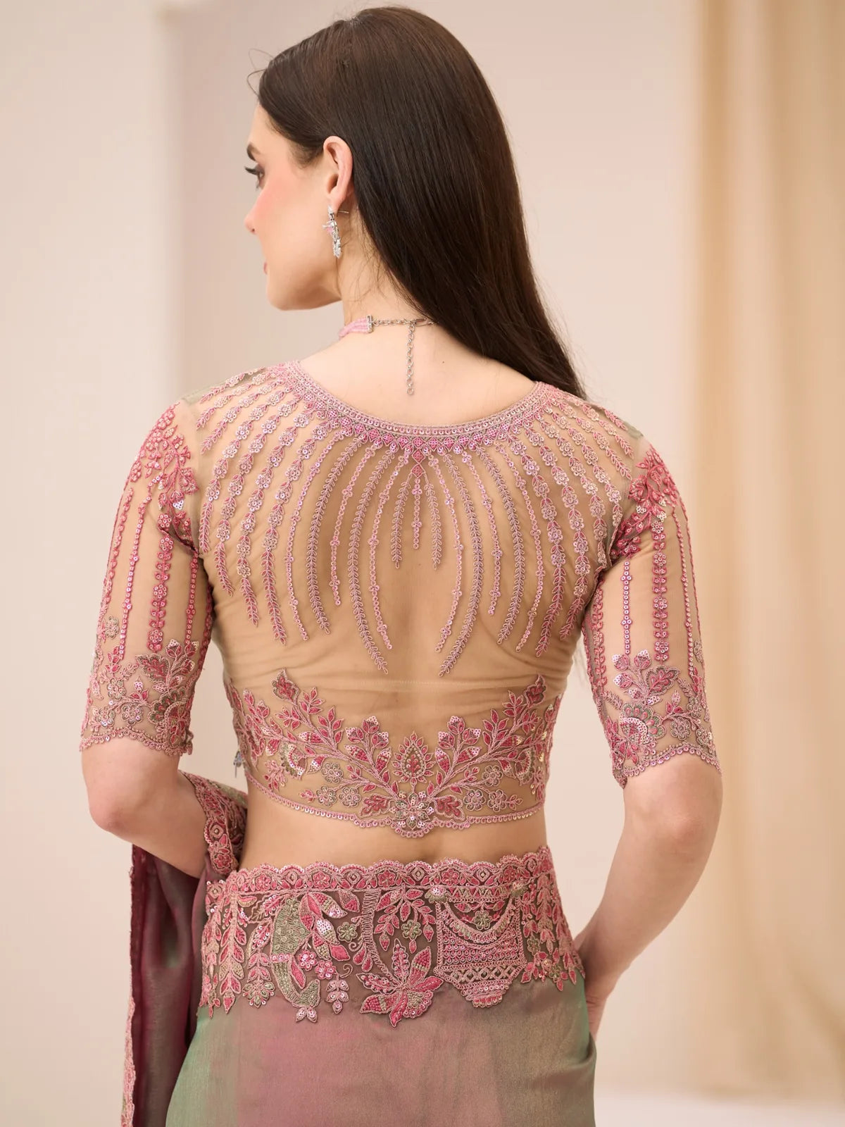 Tarani Dhanashree back blouse design with embroidery zari work detailing