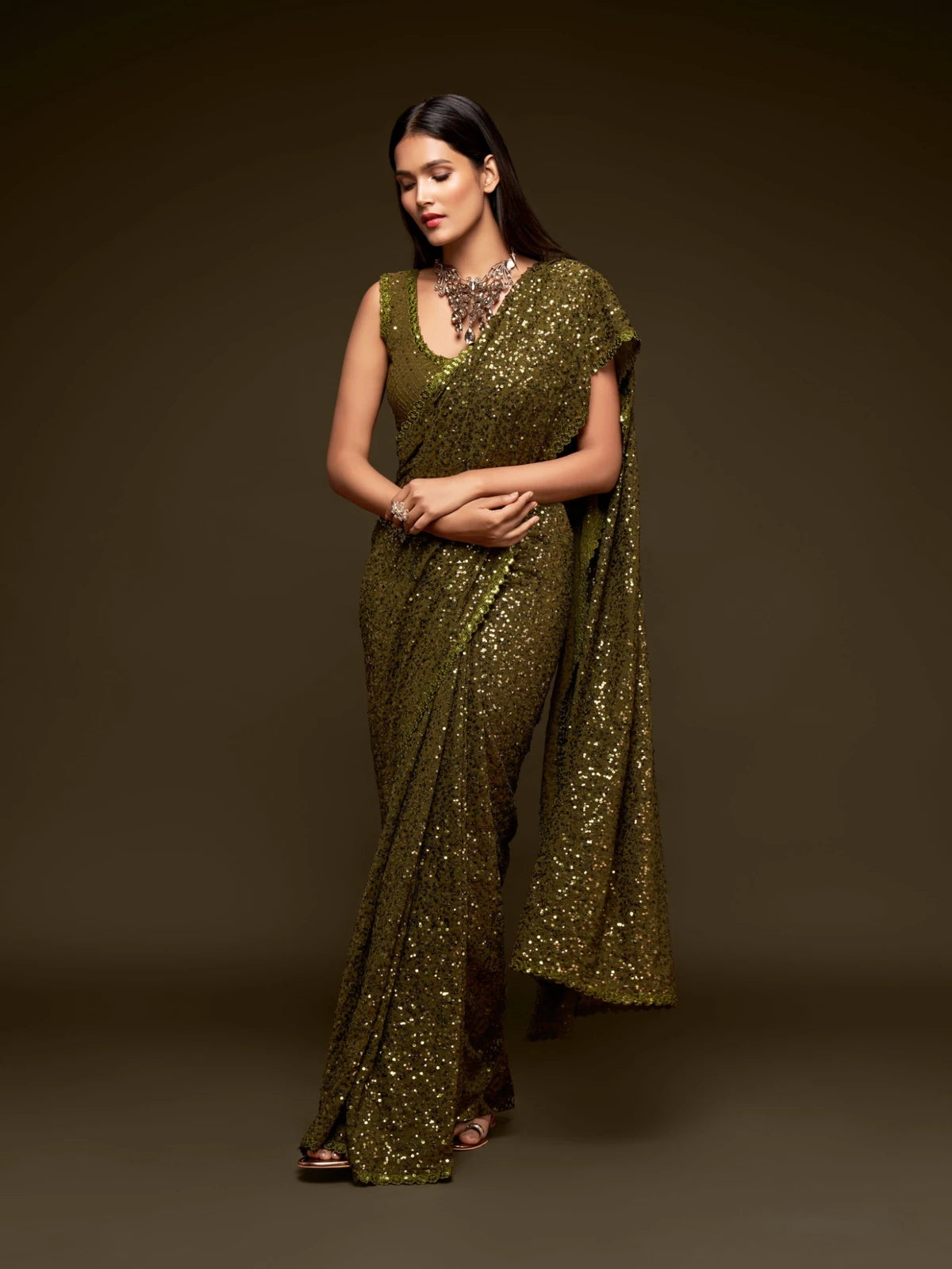 Tarani olive green designer georgette saree front pose with embroidered blouse