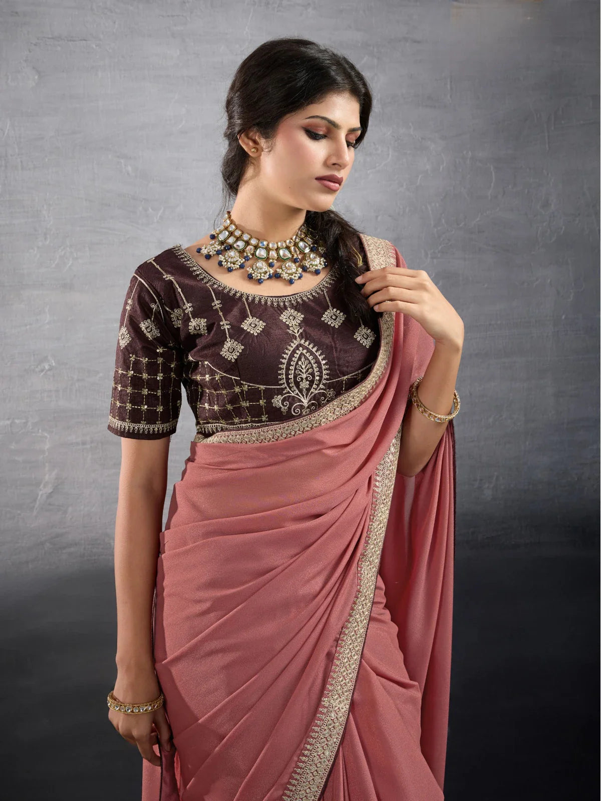 Tarani peach georgette saree upper body view with embroidered Banglori silk blouse