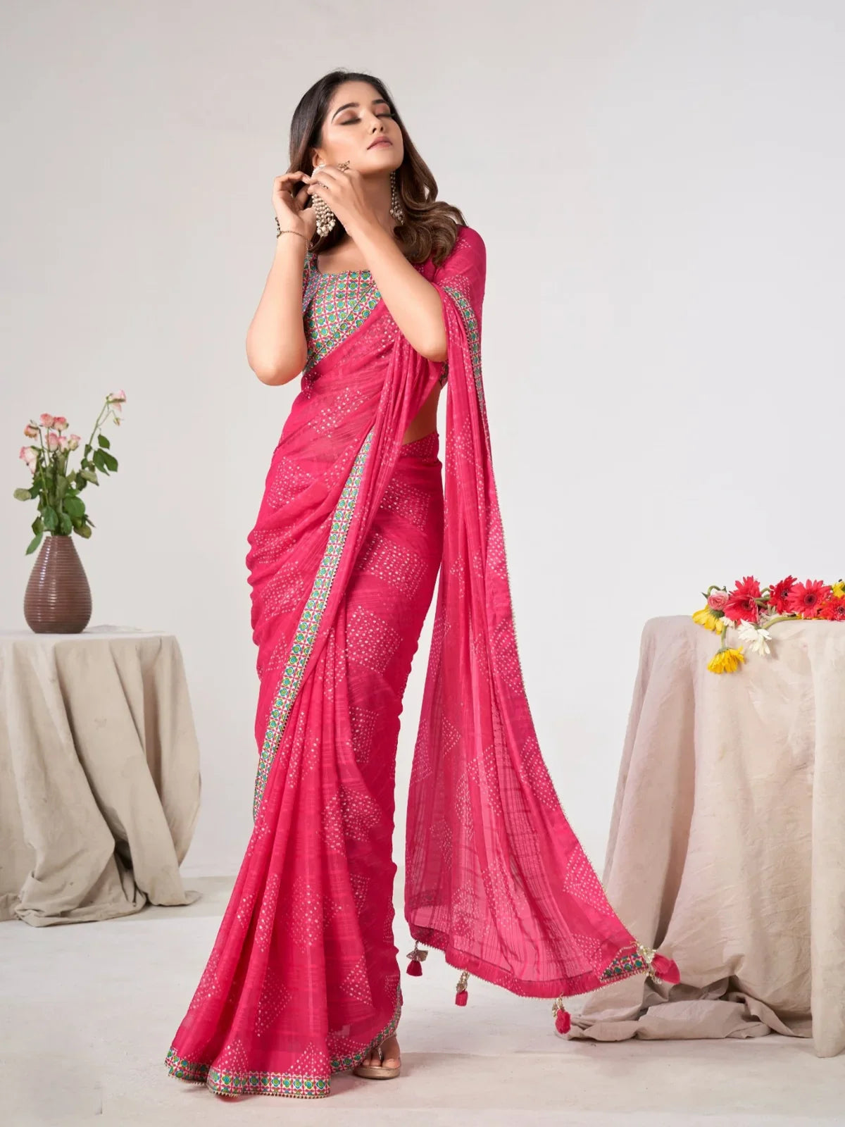 Tarani premium pink georgette saree with mirror embroidered border and silk blend blouse for festive wear
