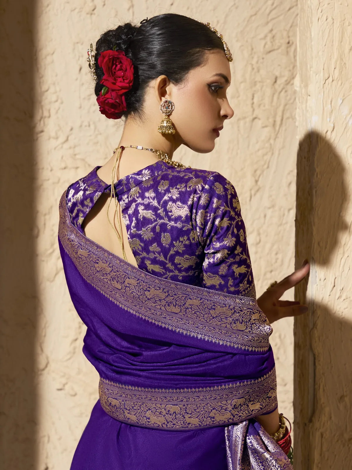Tarani purple blouse design with back tie-up and woven floral motifs