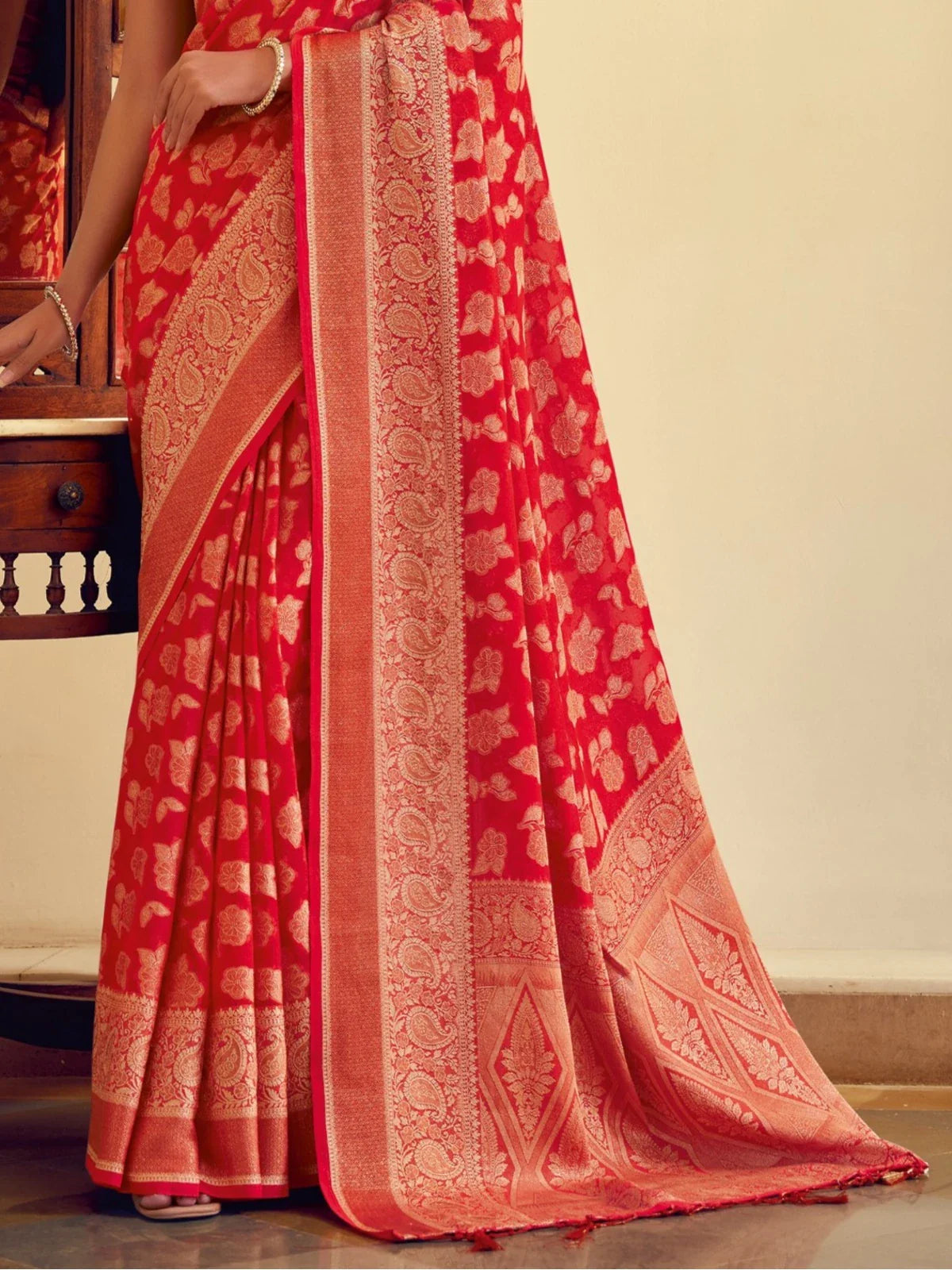 Tarani red georgette saree pallu and border design with fine weaving pattern