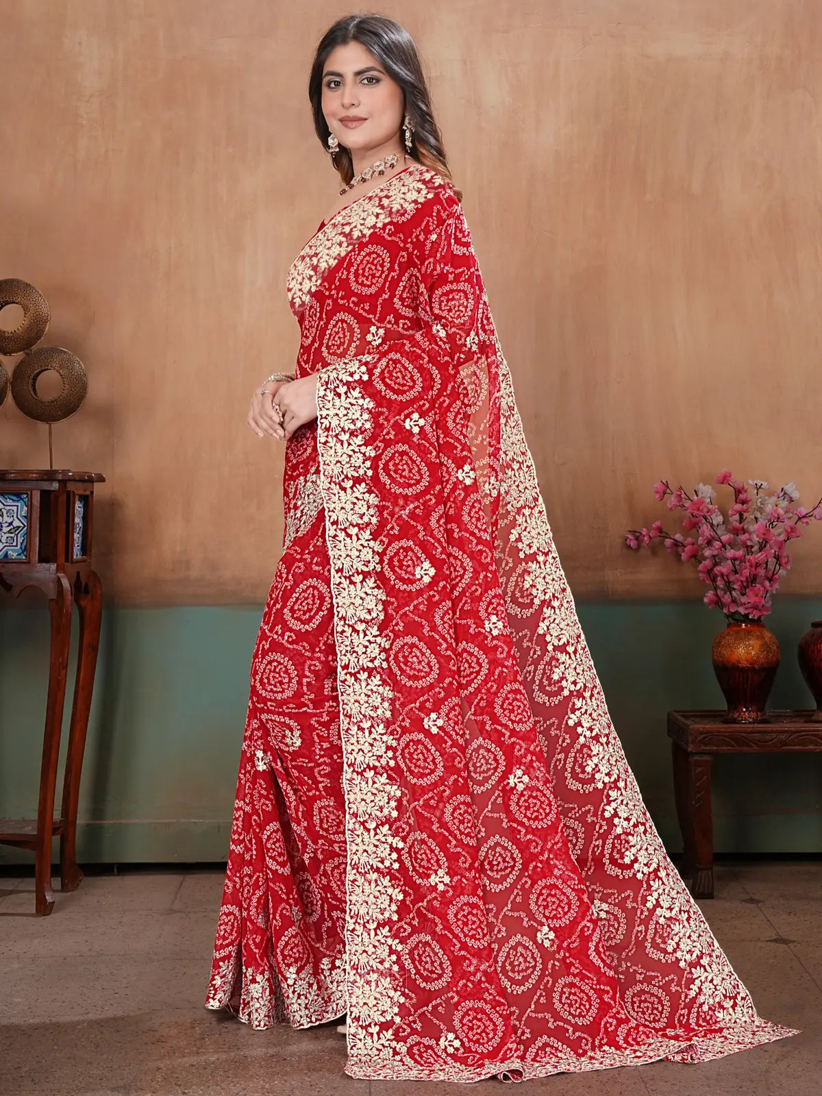 Tarani red georgette saree side view showing border and drape