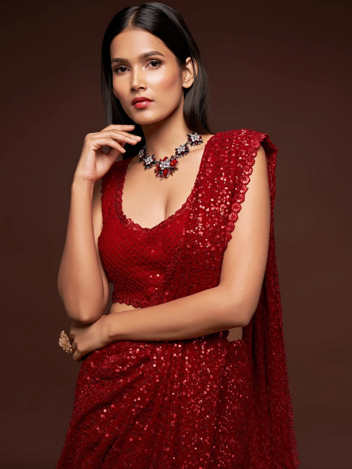 Tarani red georgette saree upper body view with sequins embroidered blouse design