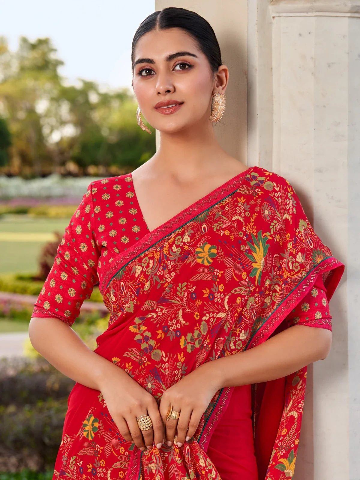 Tarani red georgette saree party wear upper body view with blouse design