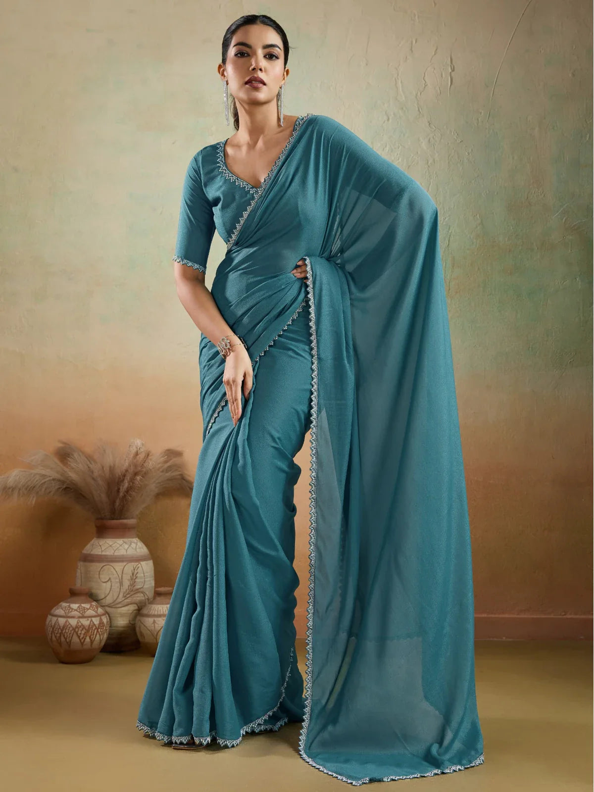 Tarani teal georgette party wear saree with lace work full front view