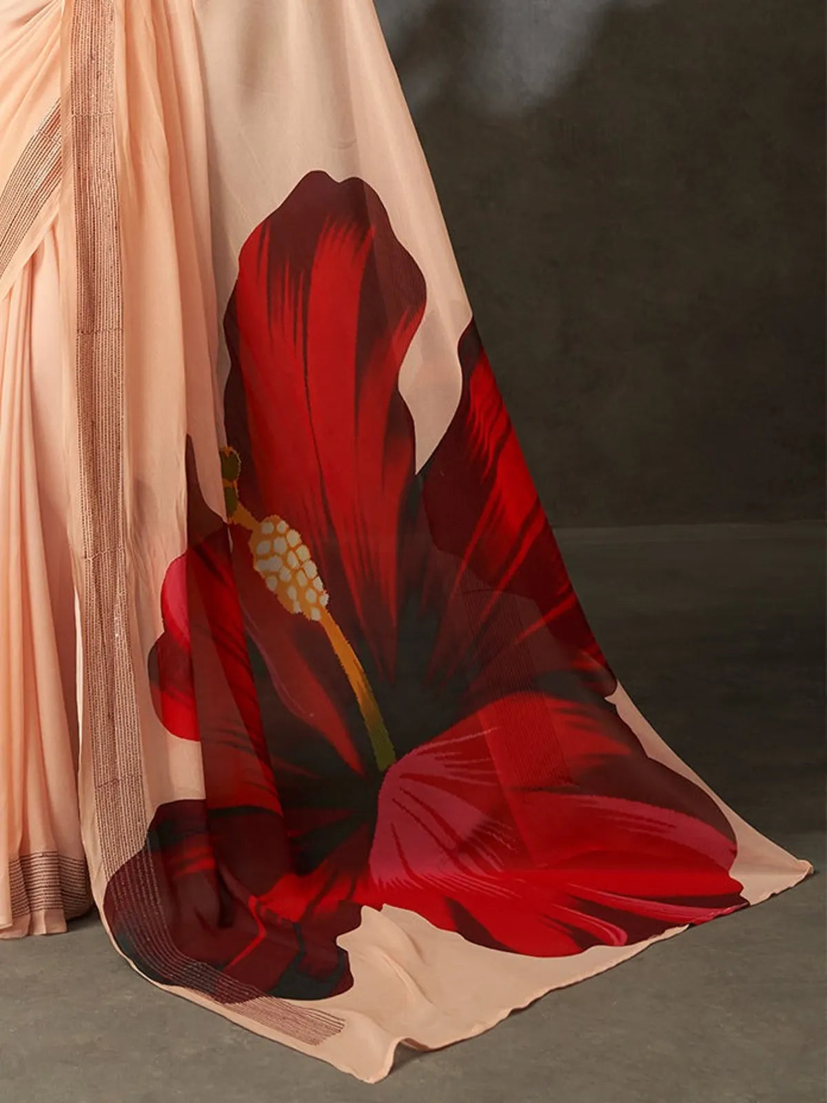 Tarani peach georgette silk saree closeup view with floral blouse design