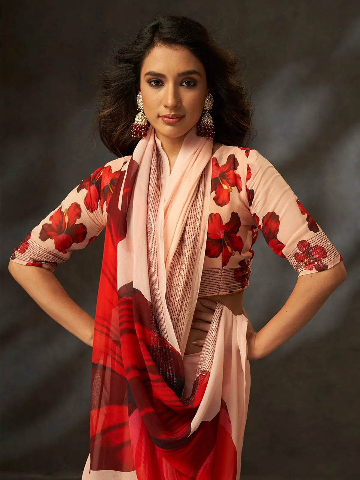 Tarani peach georgette silk saree front view with floral blouse design
