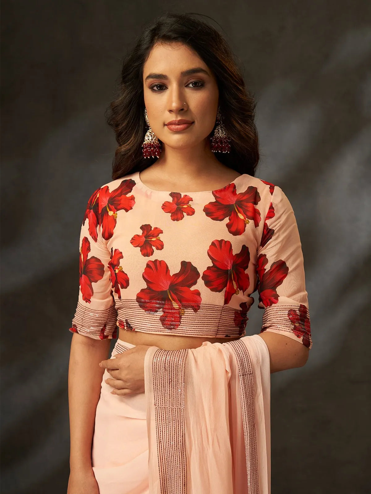 Tarani peach georgette silk saree upper body view with floral blouse design