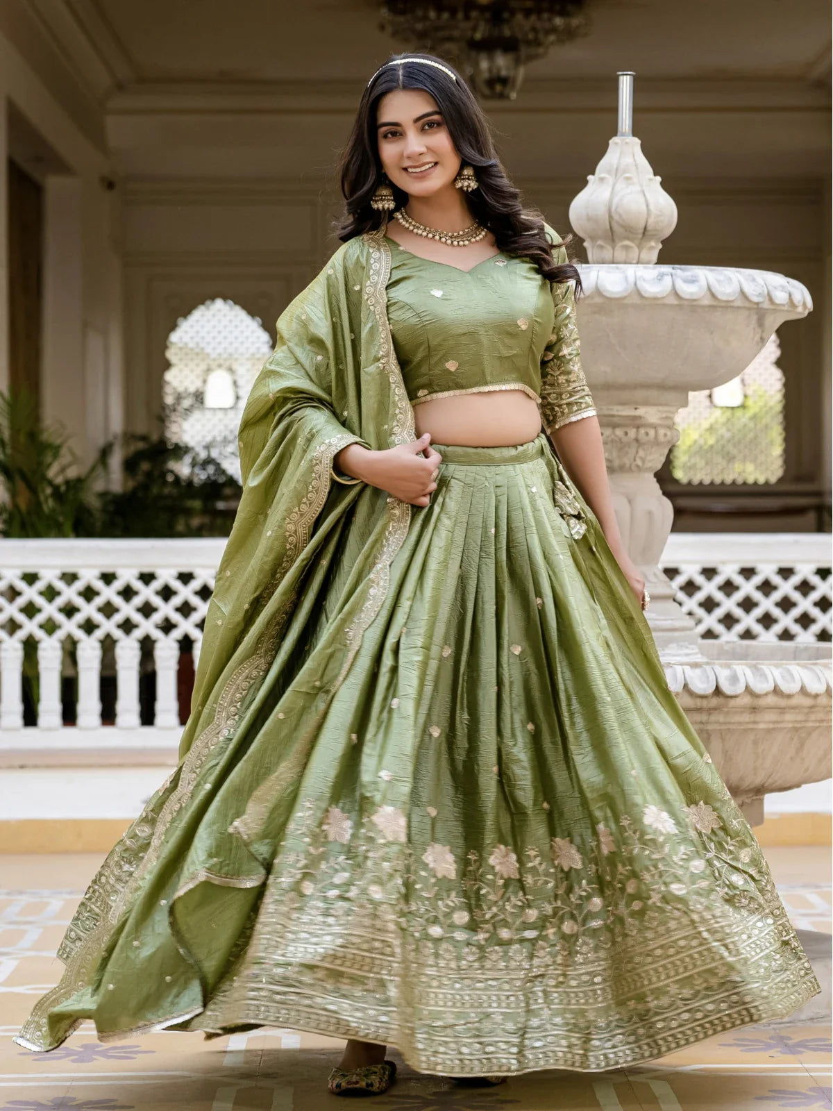 Tarani traditional green gold crush lehenga front view with heavy embroidery work