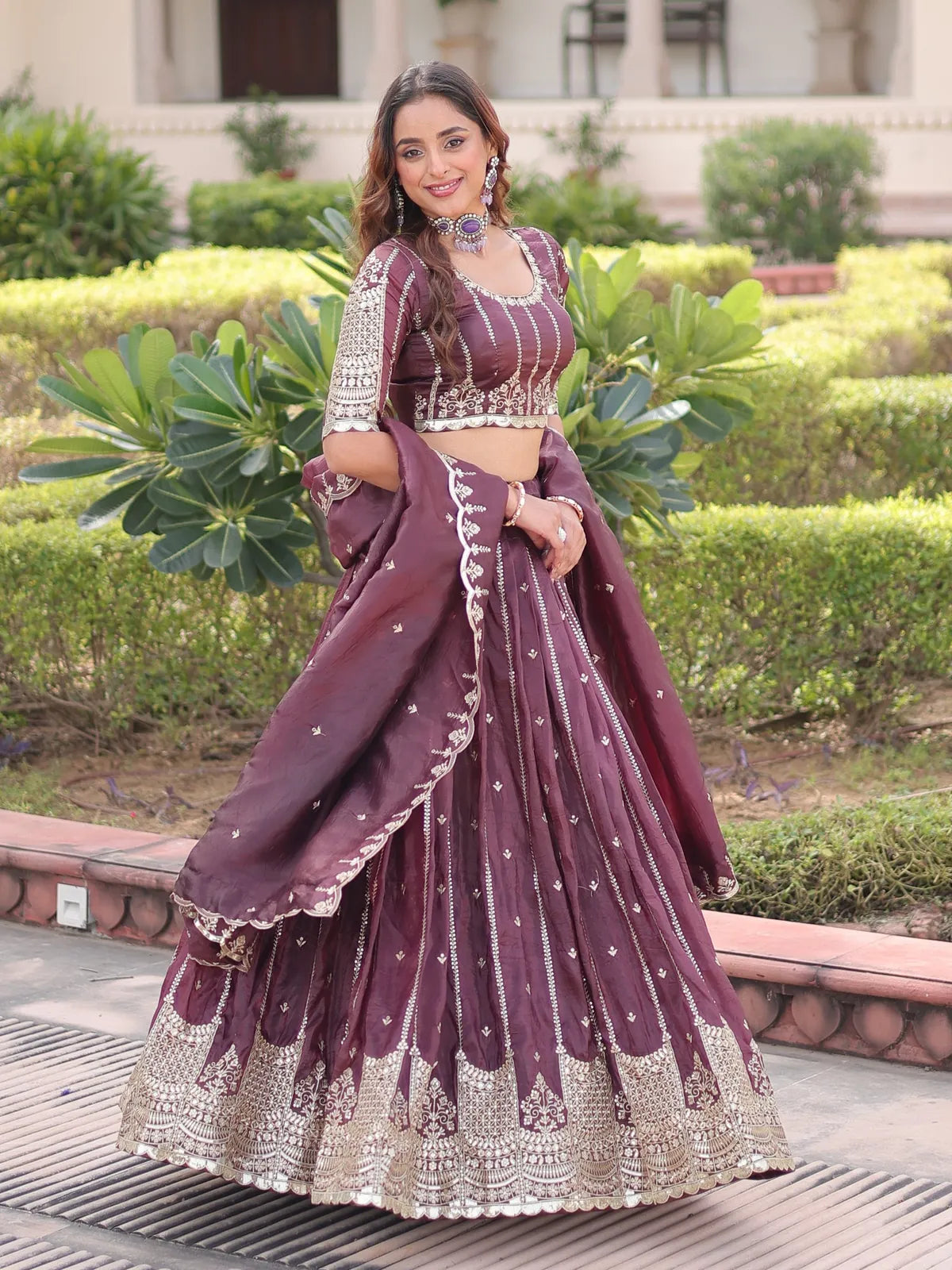 Tarani stylish maroon gold crush lehenga front pose with elegant embroidery and dupatta drape