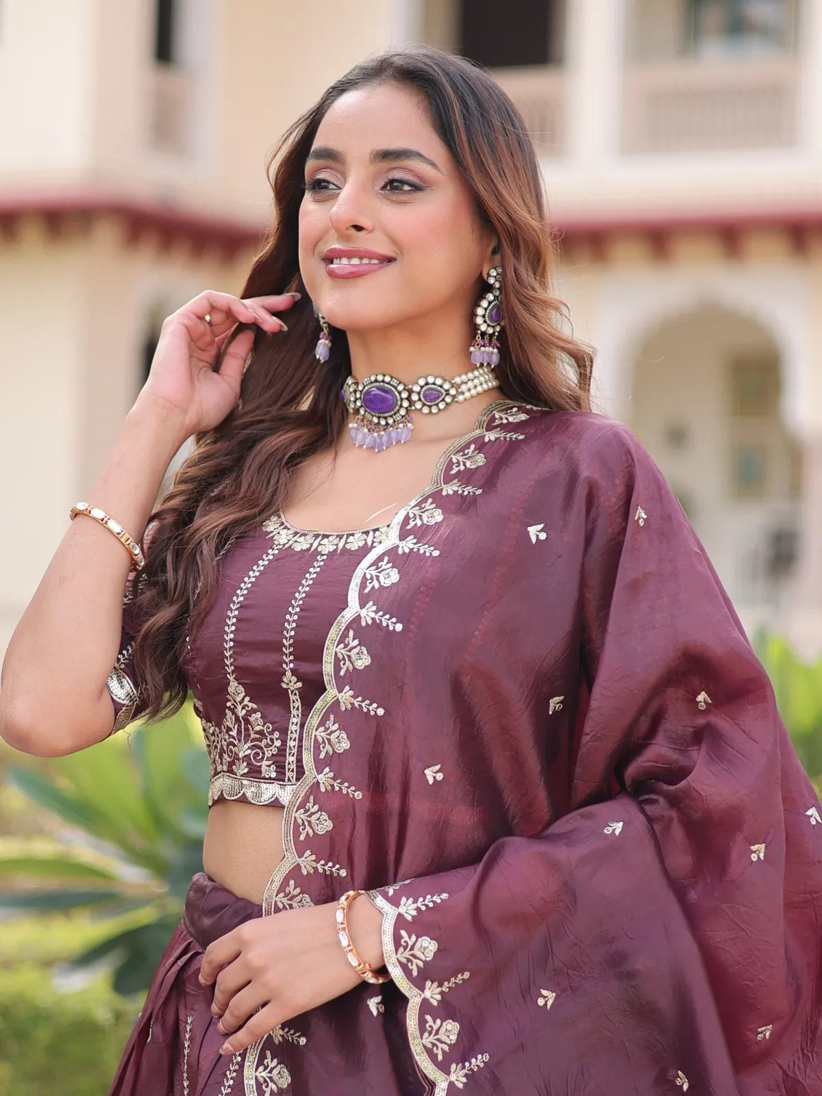 Tarani premium maroon lehenga upper body closeup showing zari blouse and dupatta details