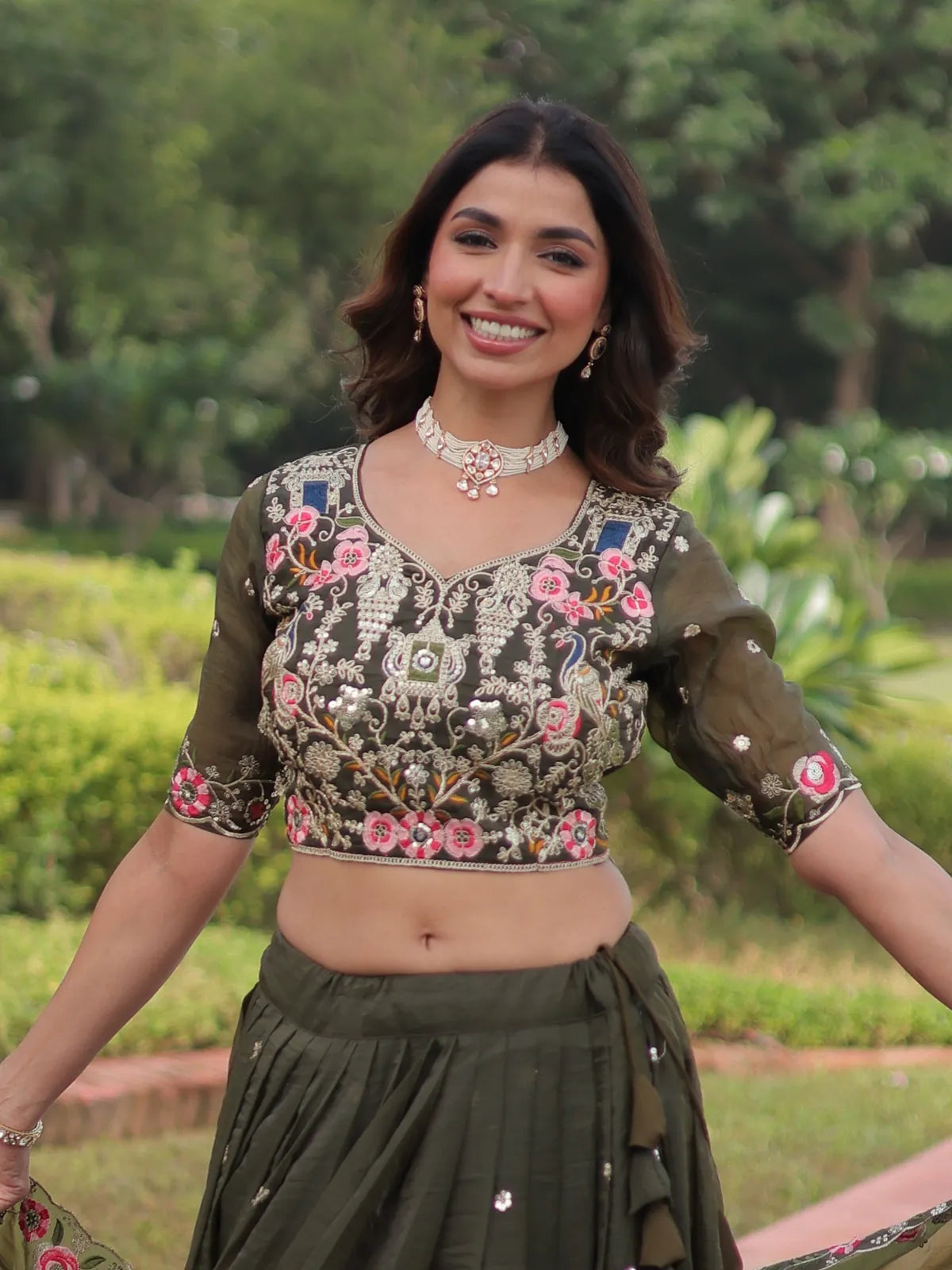 Tarani blouse close-up of gold crush green lehenga with zari sequin embroidery for festive events