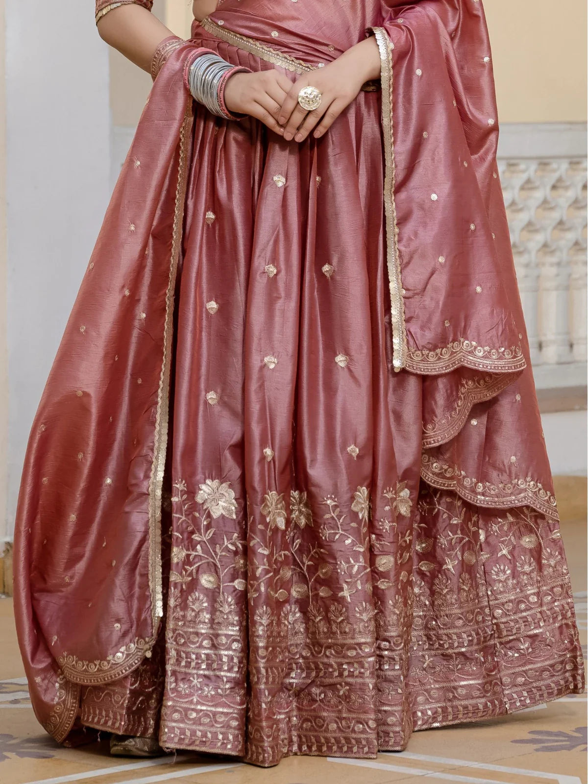 Tarani rose pink gold crush lehenga closeup view of border embroidery and detailing