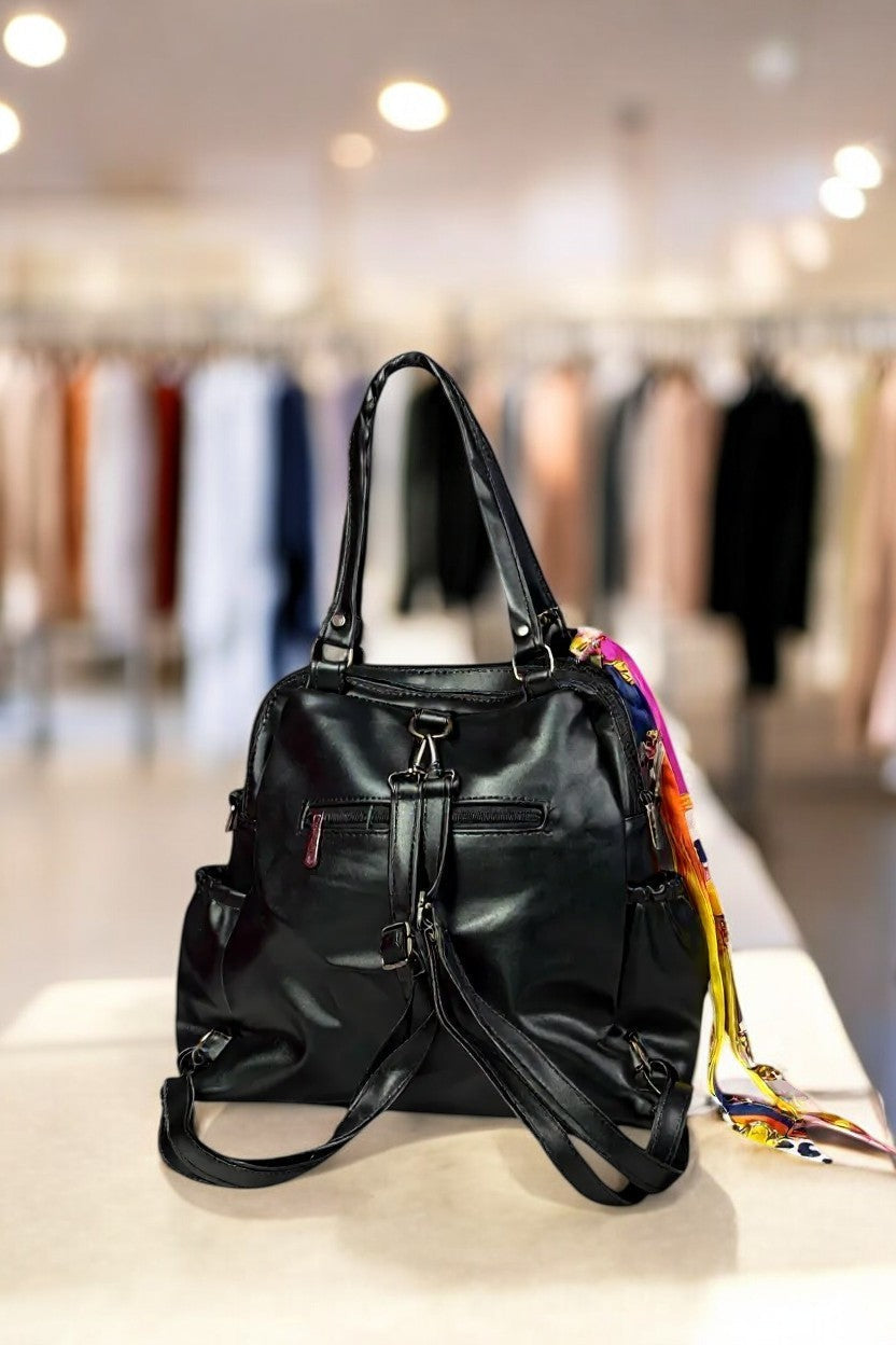 Tarani black PU leather handbag back view with compartments