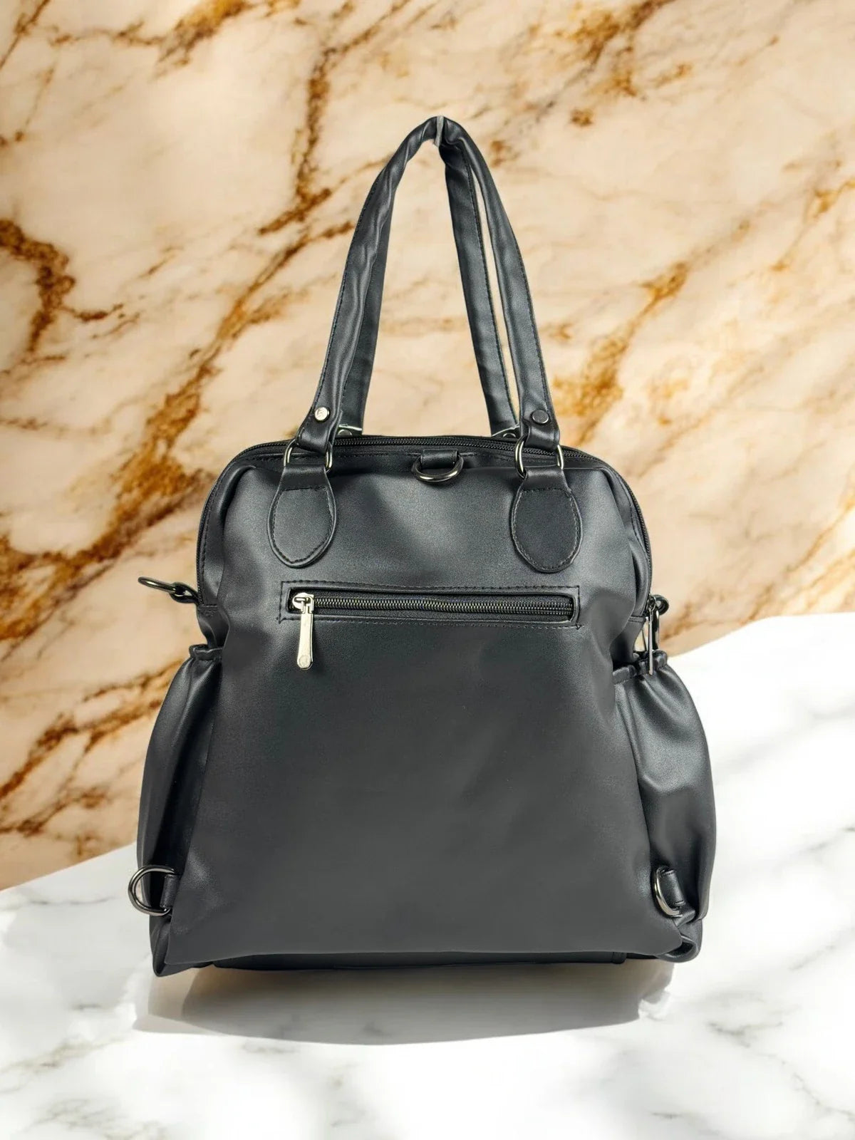 Tarani black PU leather handbag back view with zipper