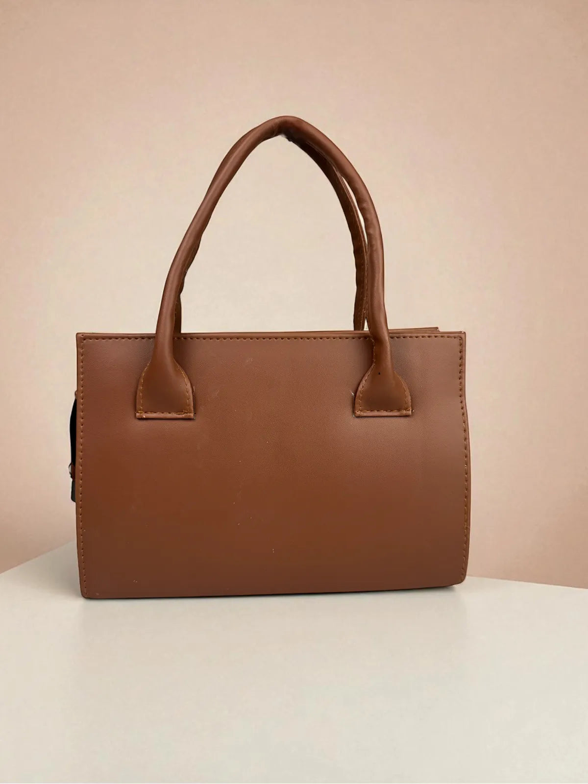 Tarani brown PU leather handbag classic back design