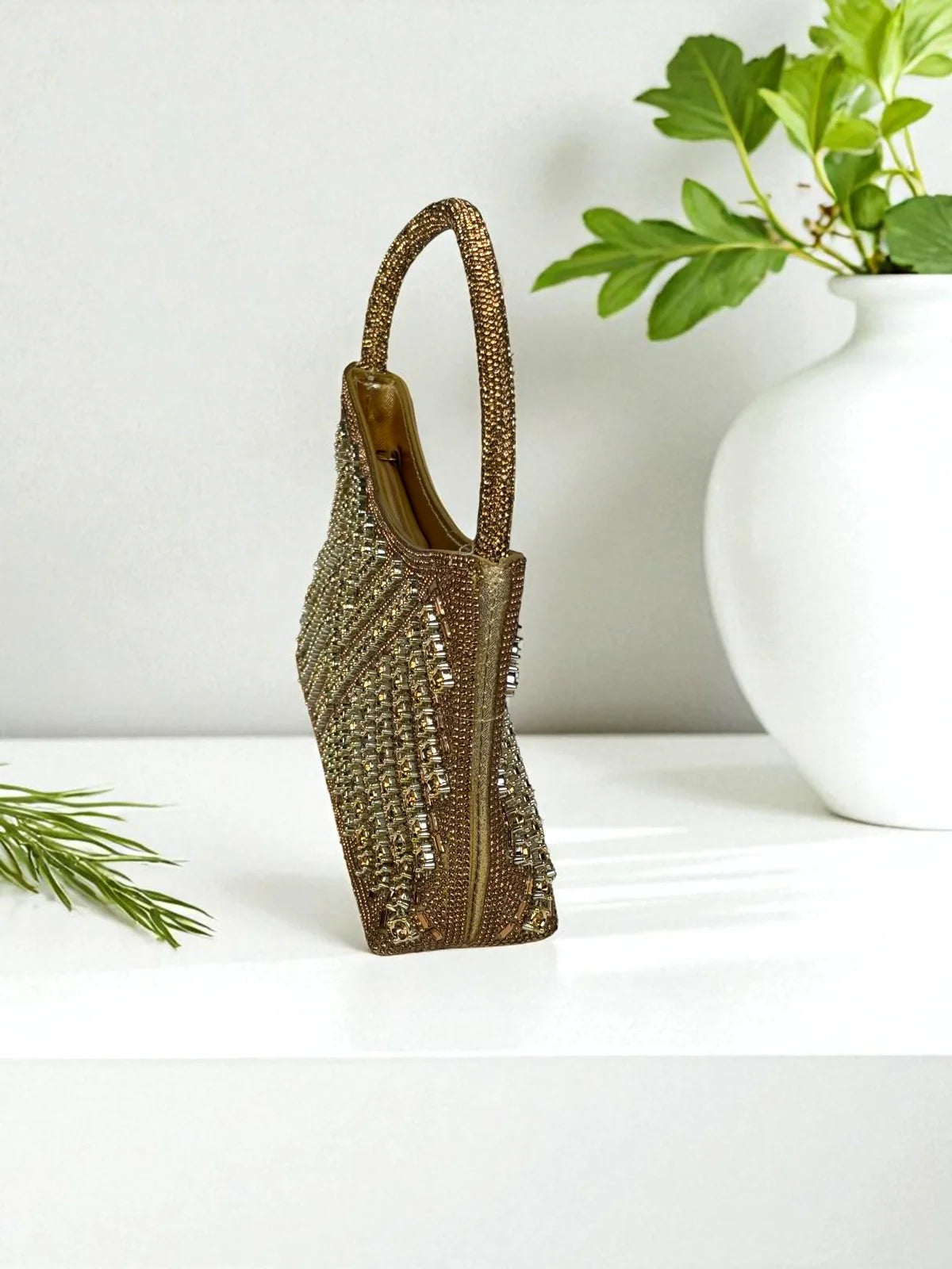 Tarani brown PU leather embellished handbag side view elegant design