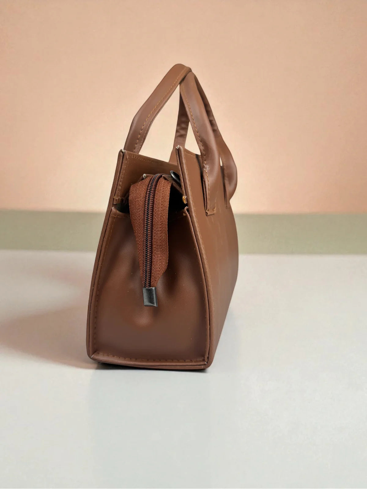 Tarani brown PU leather handbag elegant side view