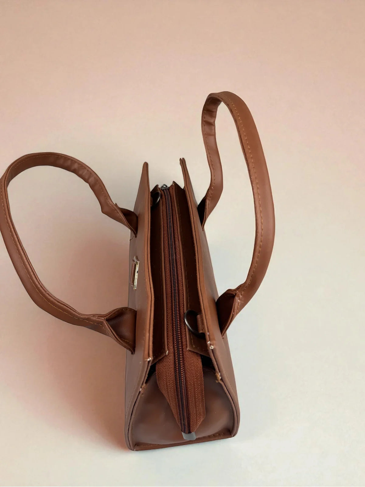 Tarani brown PU leather handbag structured top view
