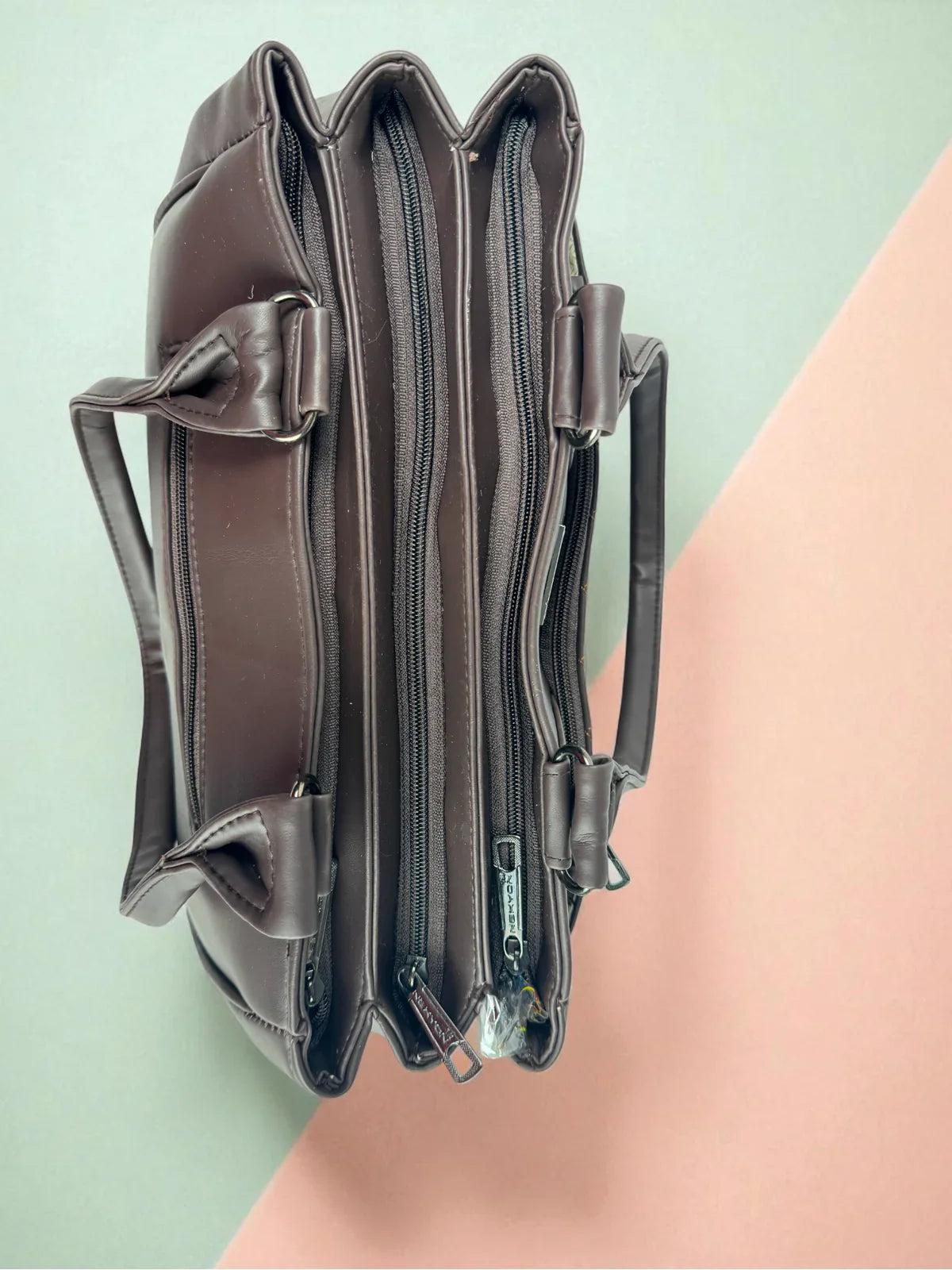 Tarani brown PU leather handbag spacious compartments top view