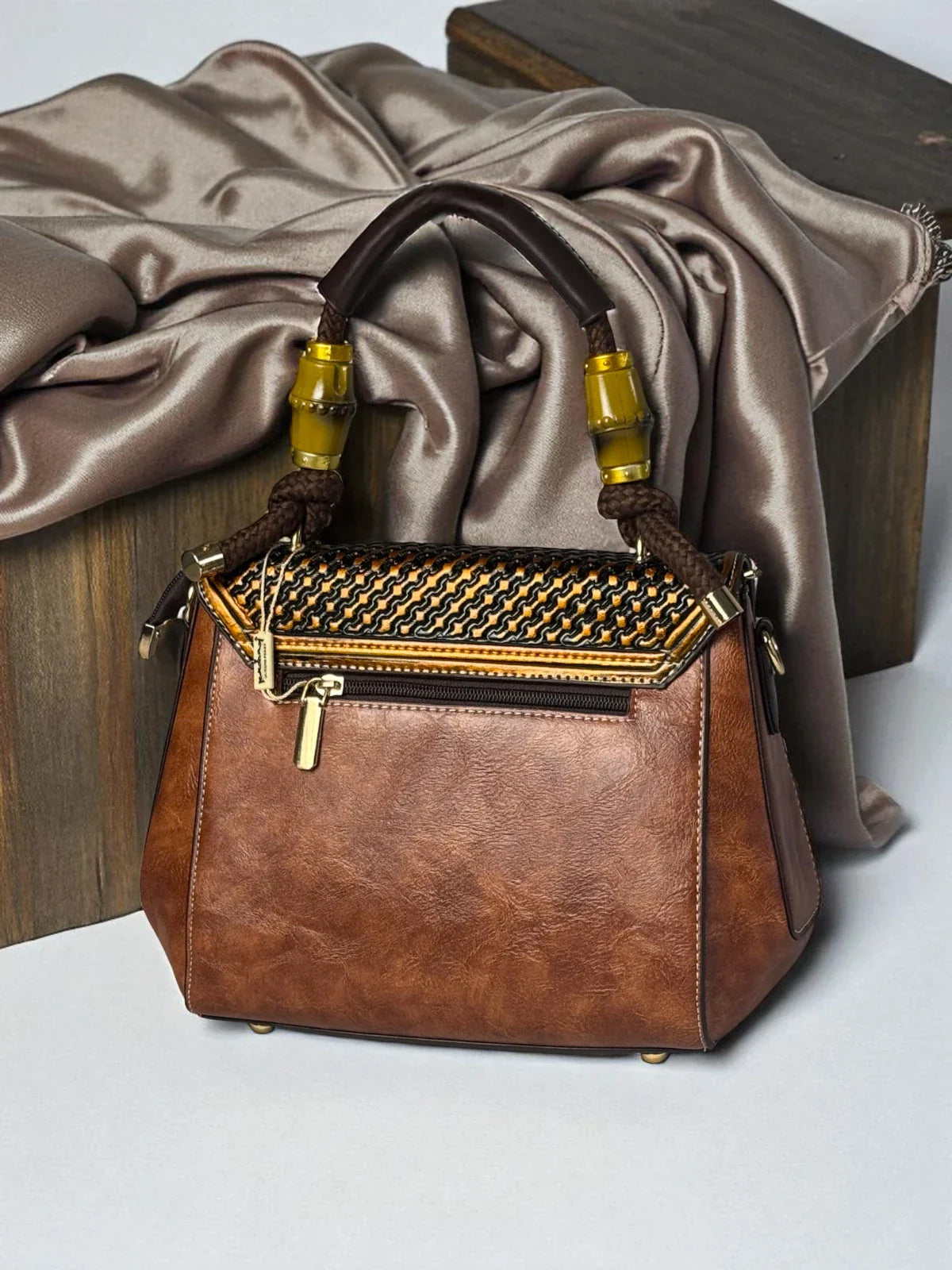 Tarani PU leather brown handbag view 2 with designer detailing