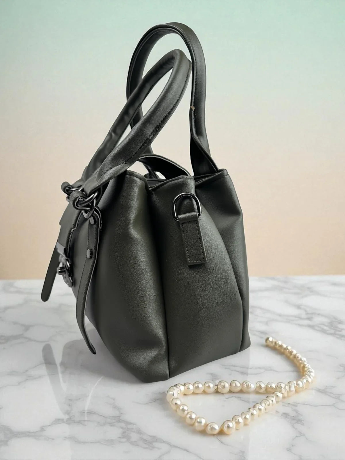 Tarani PU leather dark green handbag side view for daily and festive use