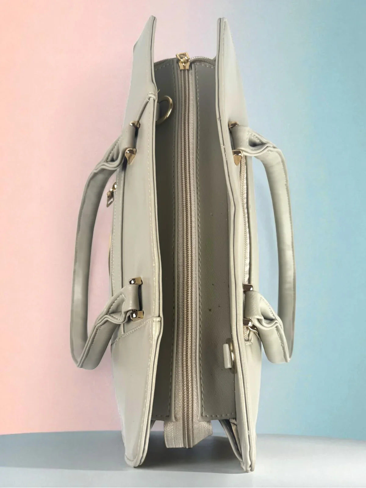 Tarani grey PU leather handbag closeup view with fine detailing