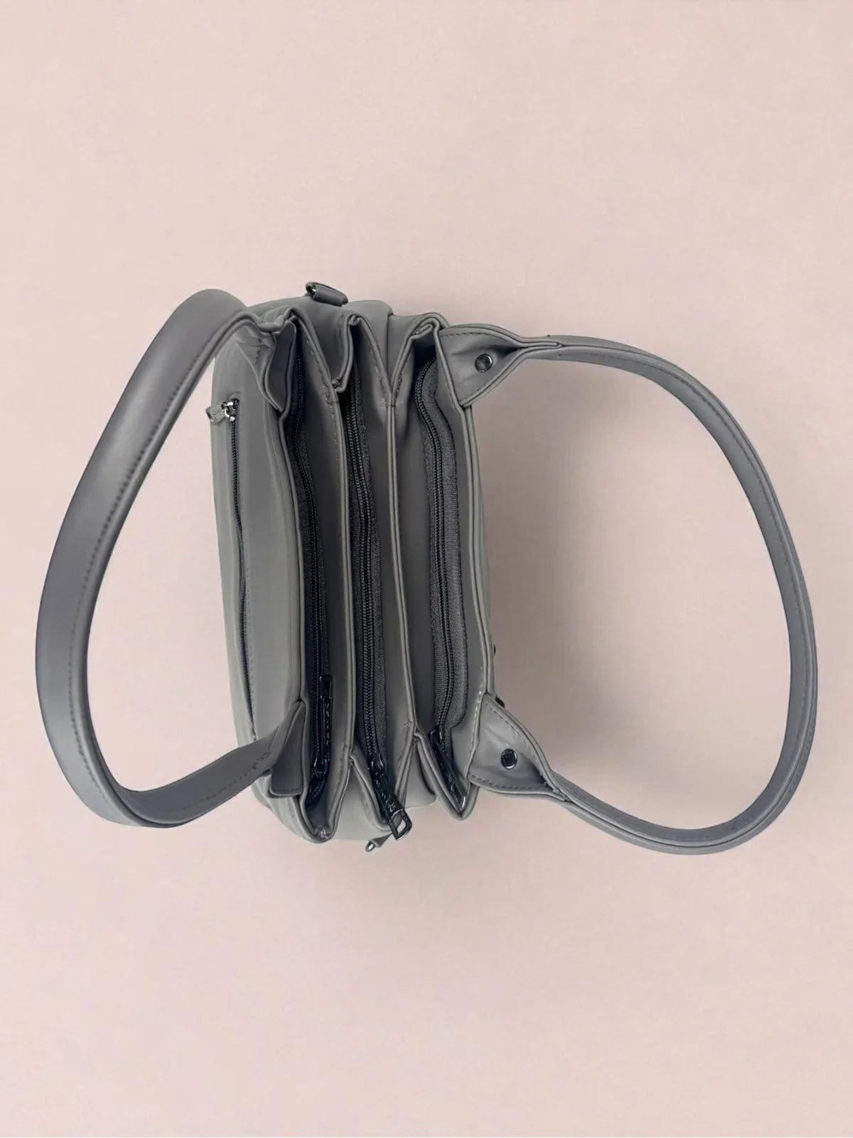 Tarani grey PU leather handbag top view showing spacious compartments