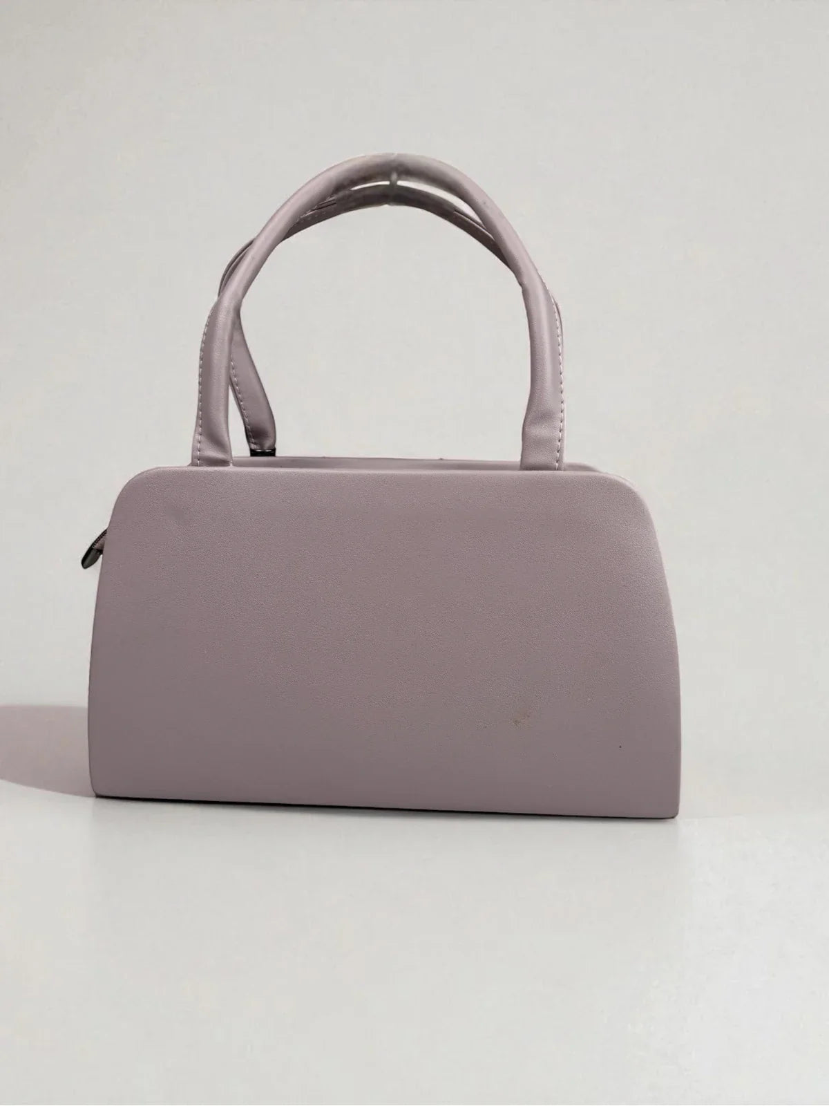 Tarani lavender PU leather handbag back view minimal design