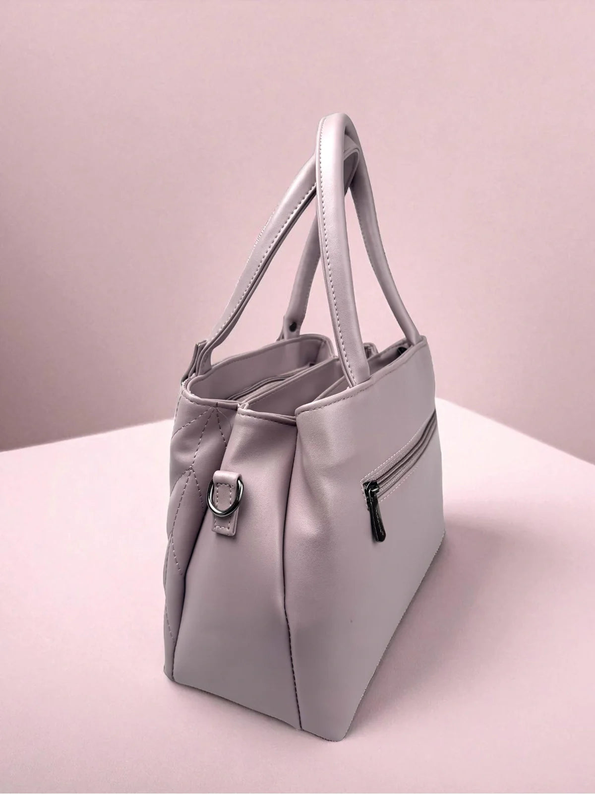Tarani Lavender PU Leather Handbag side view showing sleek finish and zipper