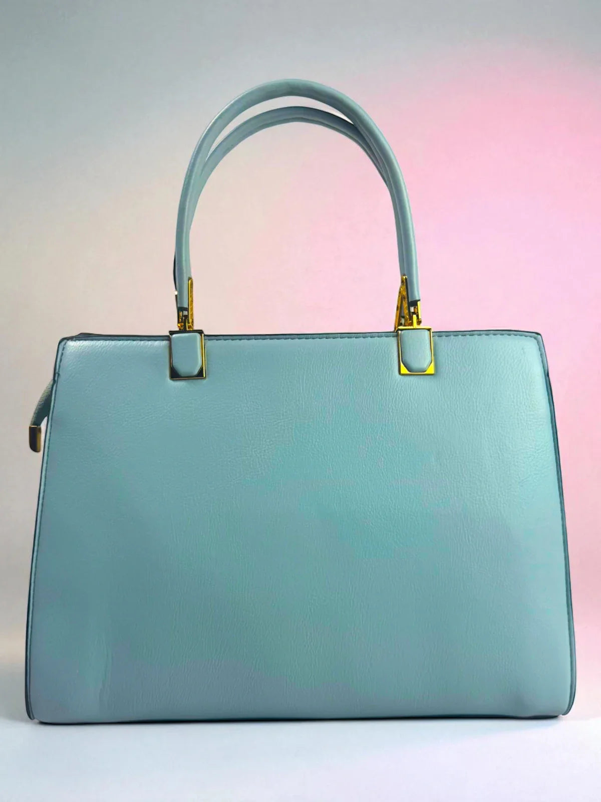 Tarani back view PU leather handbag in light blue, premium finish with elegant straps