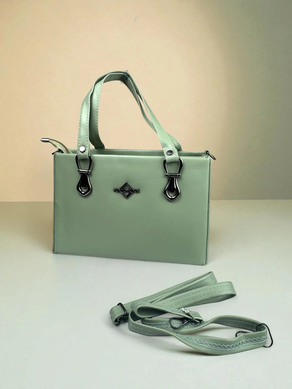 Tarani handbag in pu-leather mint green front design for daily and festive use