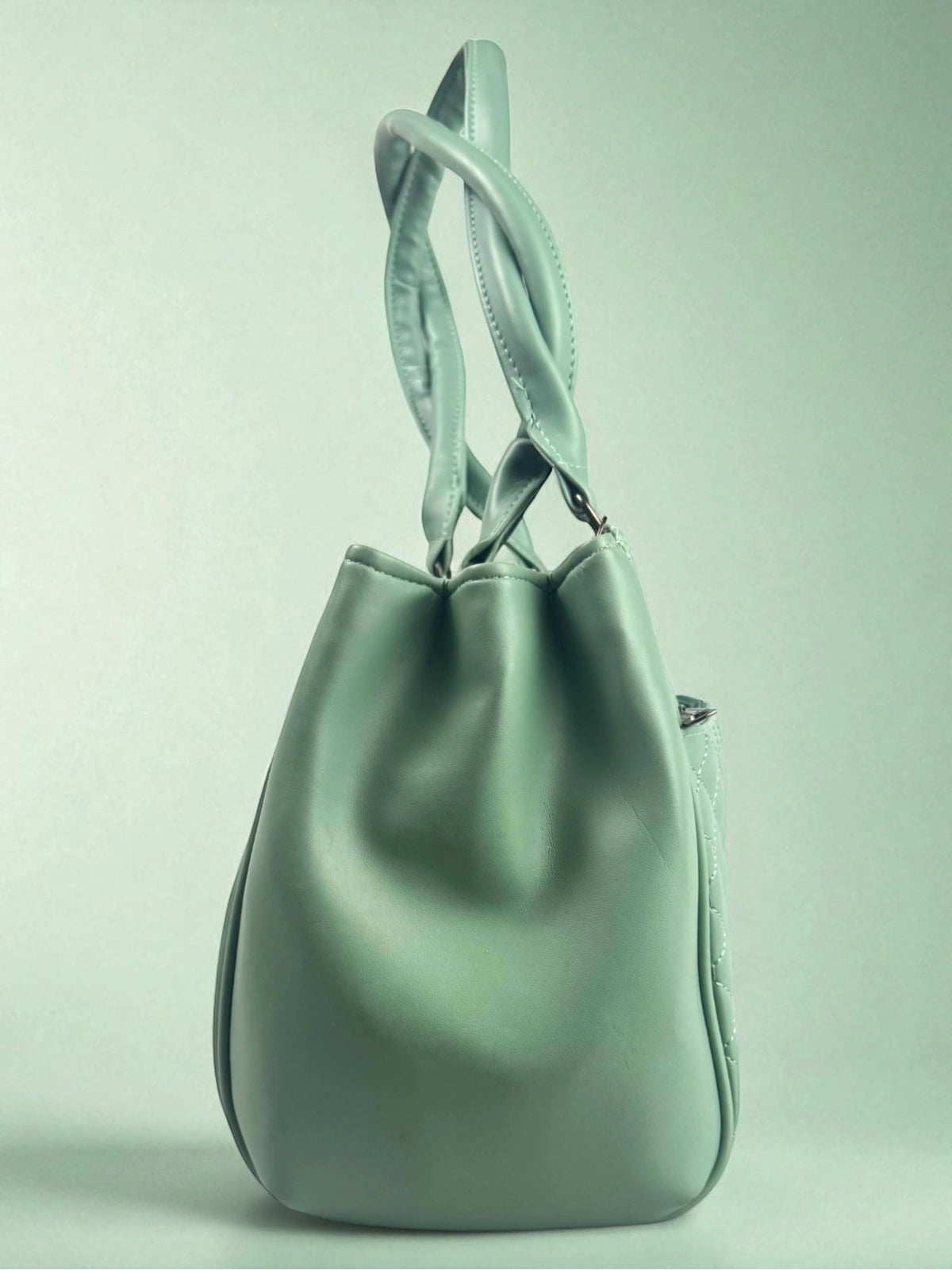 Tarani mint PU leather handbag elegant side view with dual straps