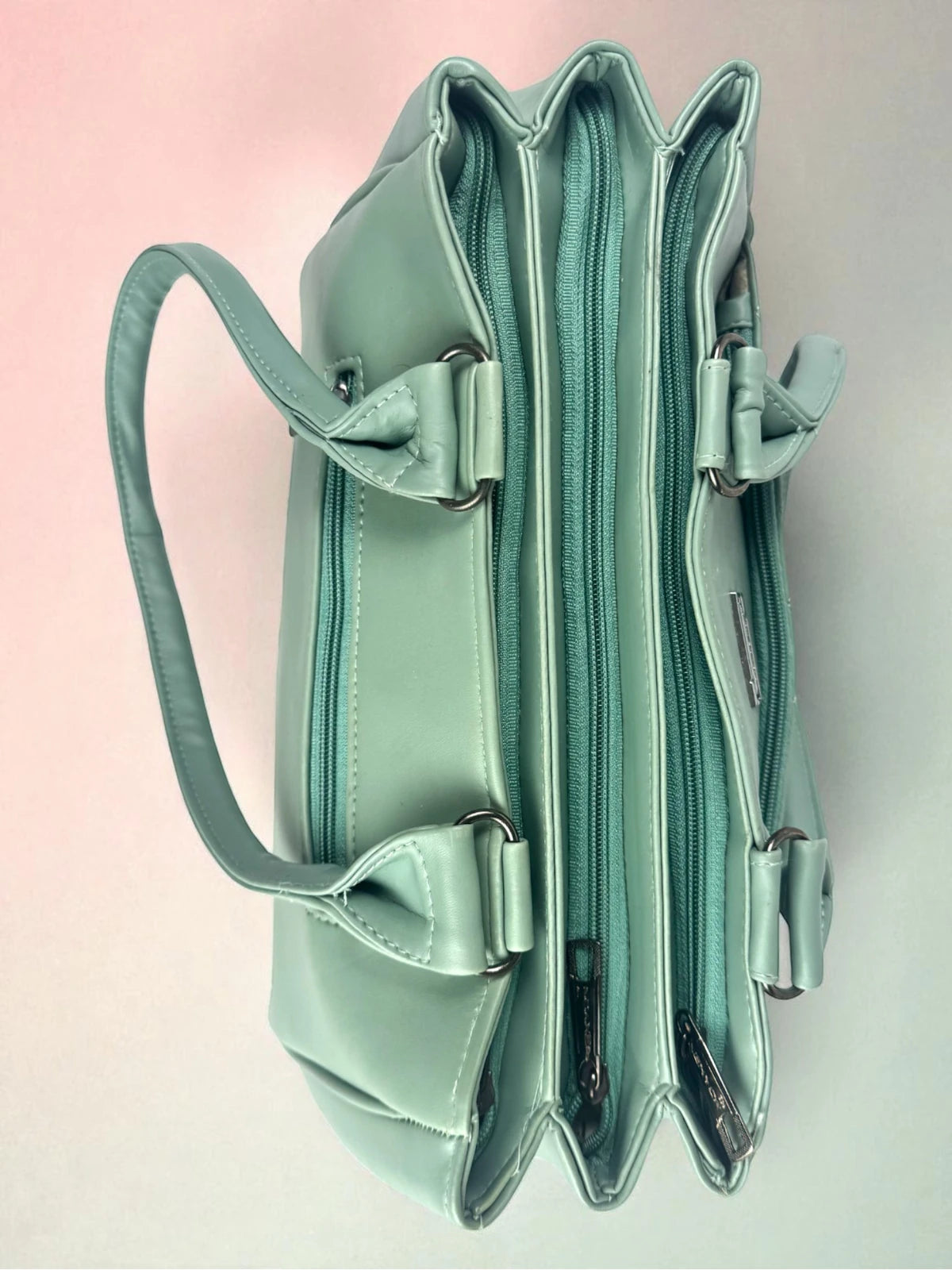 Tarani mint PU leather handbag spacious multi-compartment top view