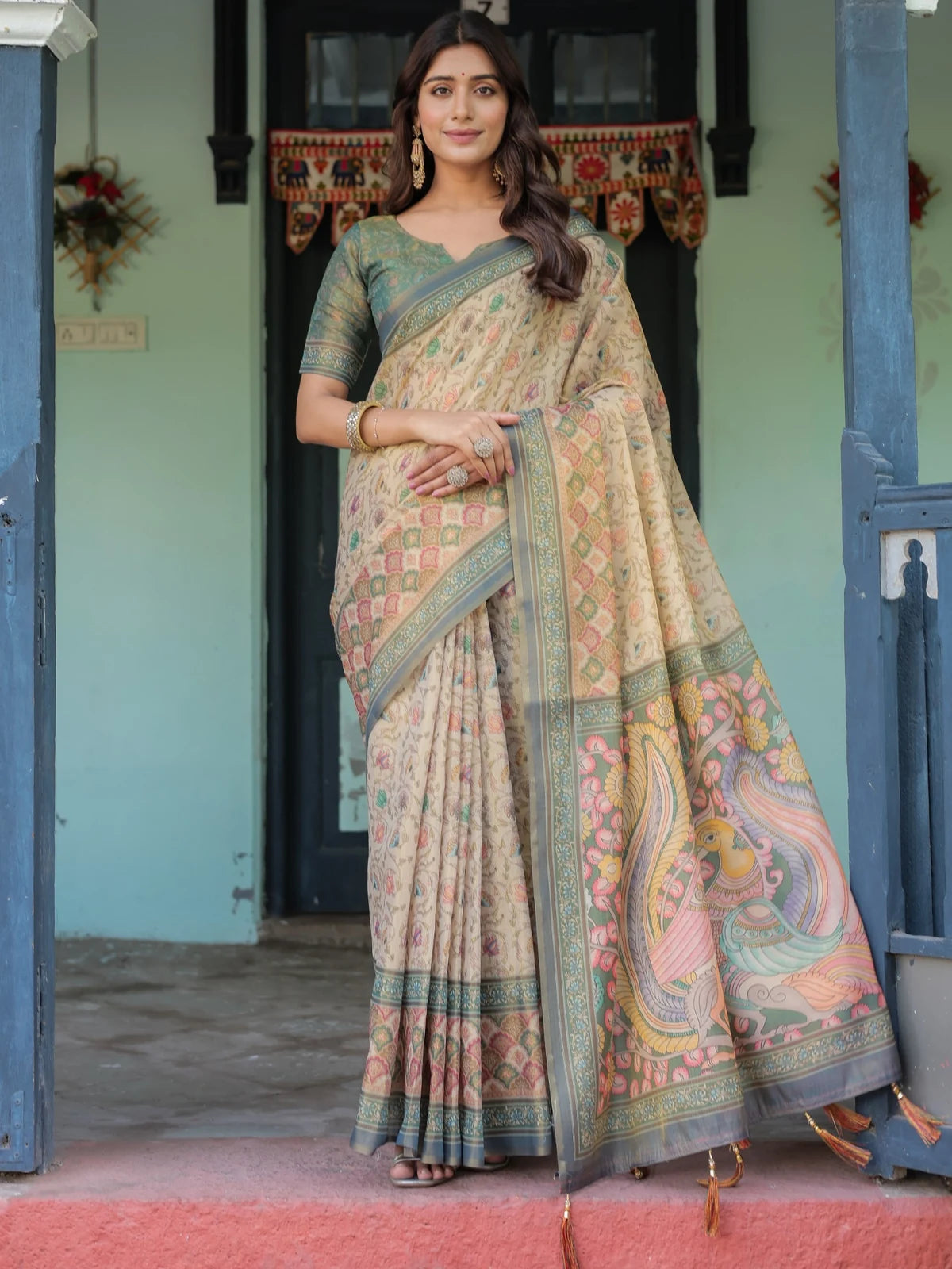 Tarani Vaibhavi premium handloom beige saree full view with floral motifs tassels and artistic pallu