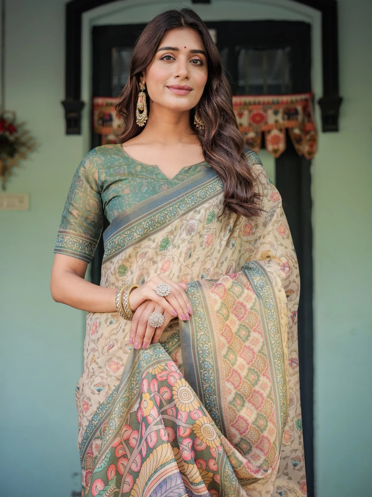 Tarani Vaibhavi premium handloom beige saree upper body view with floral border and blouse