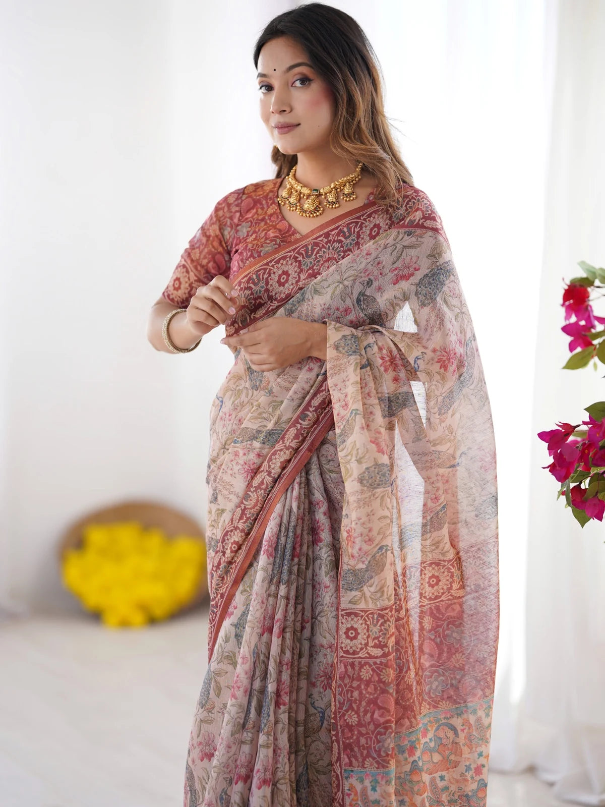 Tarani Vaishvika premium handloom beige saree upper body view with floral border and blouse
