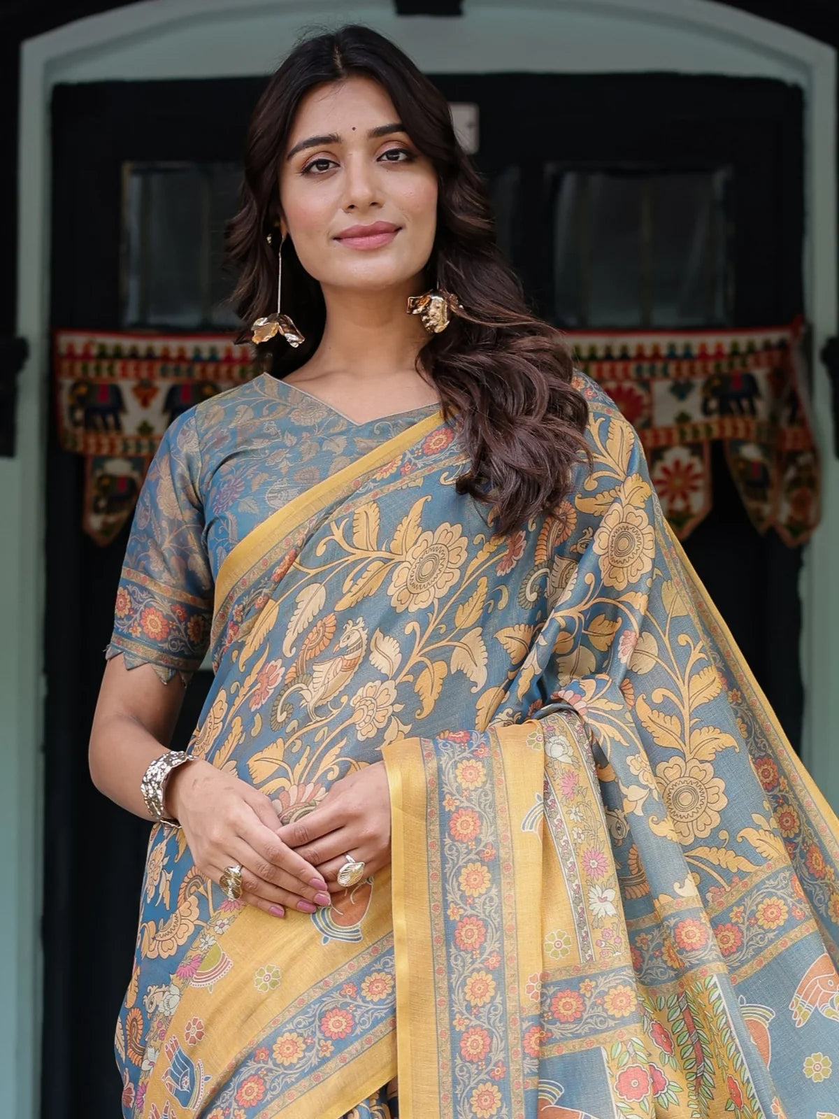 Tarani Hemashri premium handloom grey saree upper body view with floral weave and elegant border