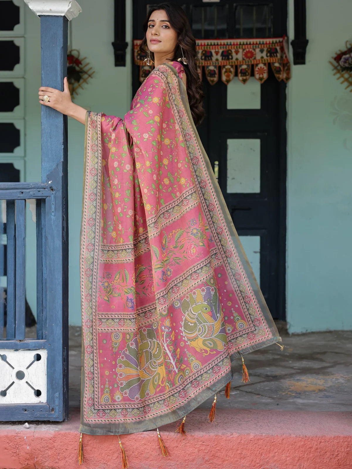 Tarani Kalashri pink handloom saree pallu view with heritage artwork and tassels