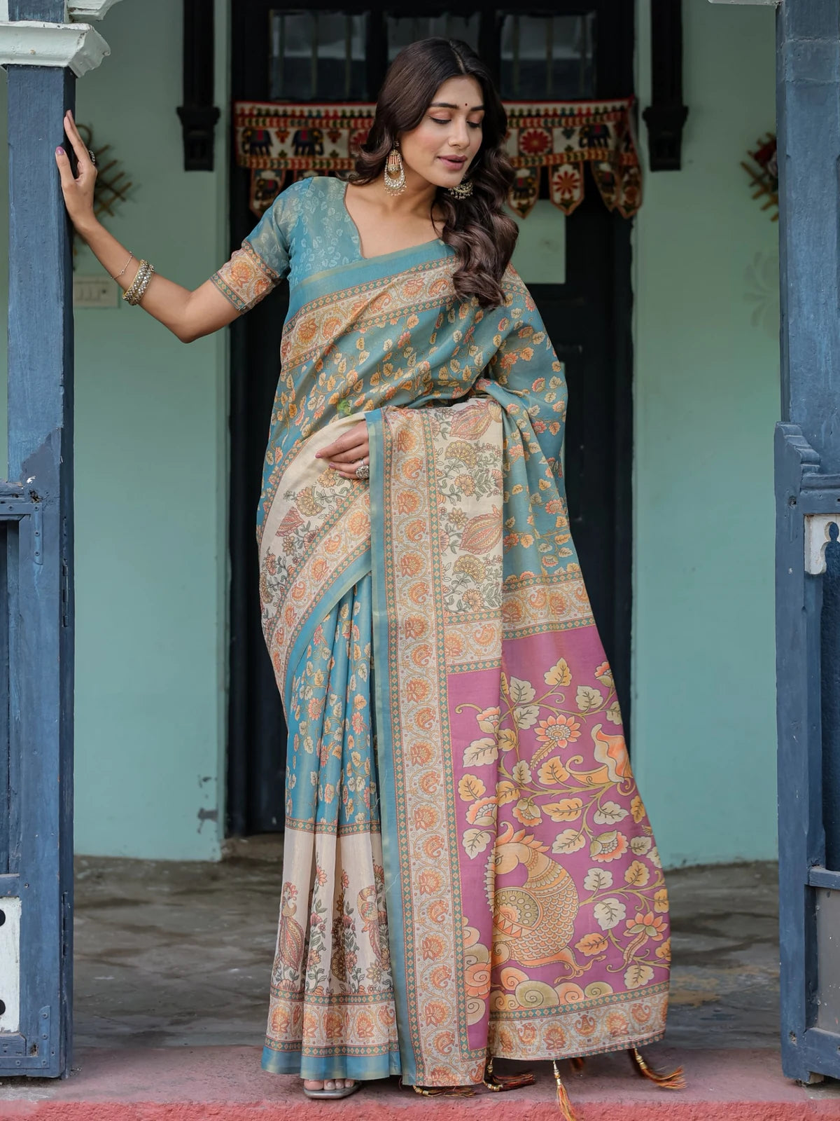 Tarani teal premium handloom saree full view with floral motifs heritage pallu and attached blouse Lipisha