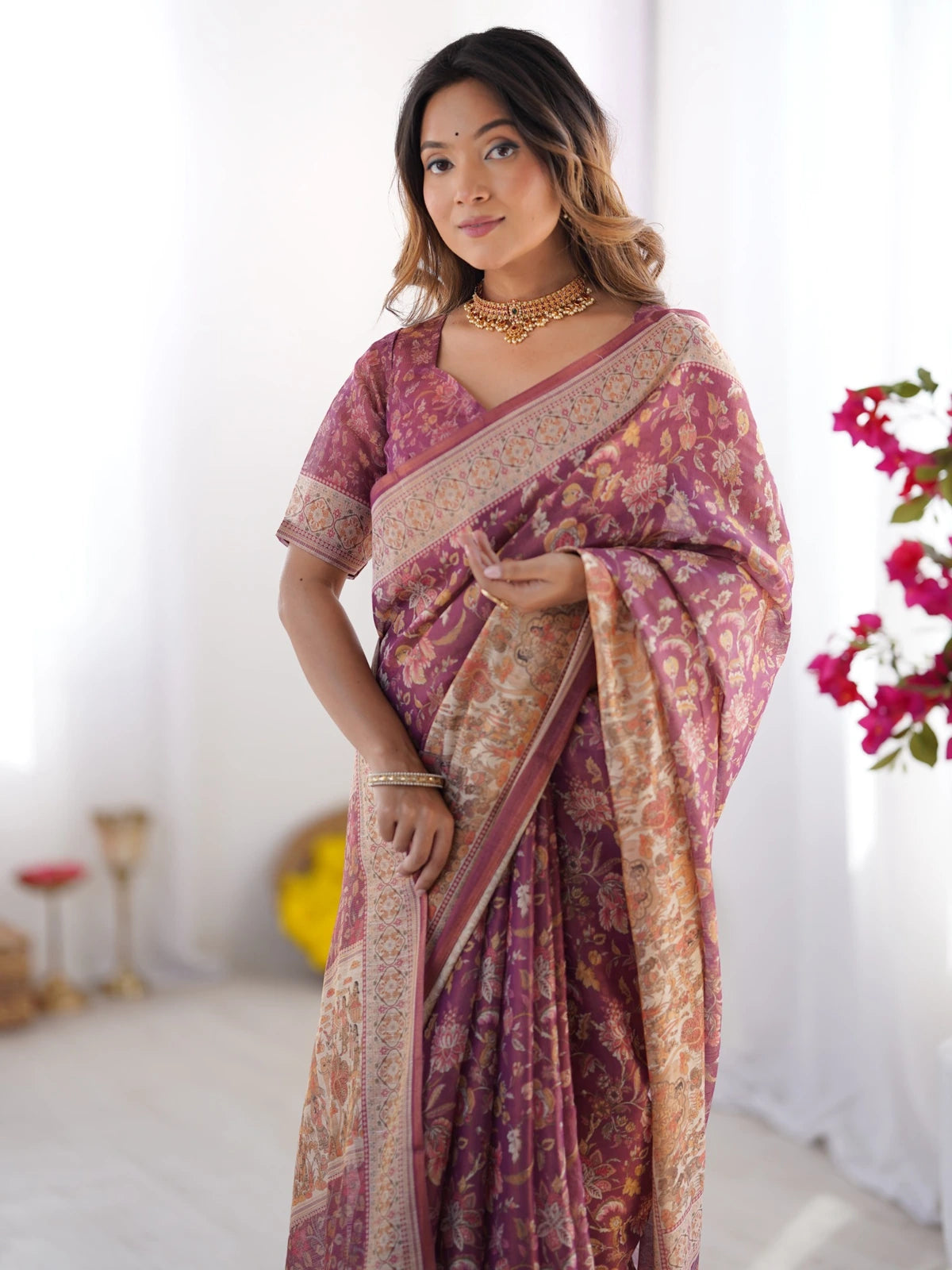 Tarani maroon handloom saree upper body view with floral border and ethnic printed blouse