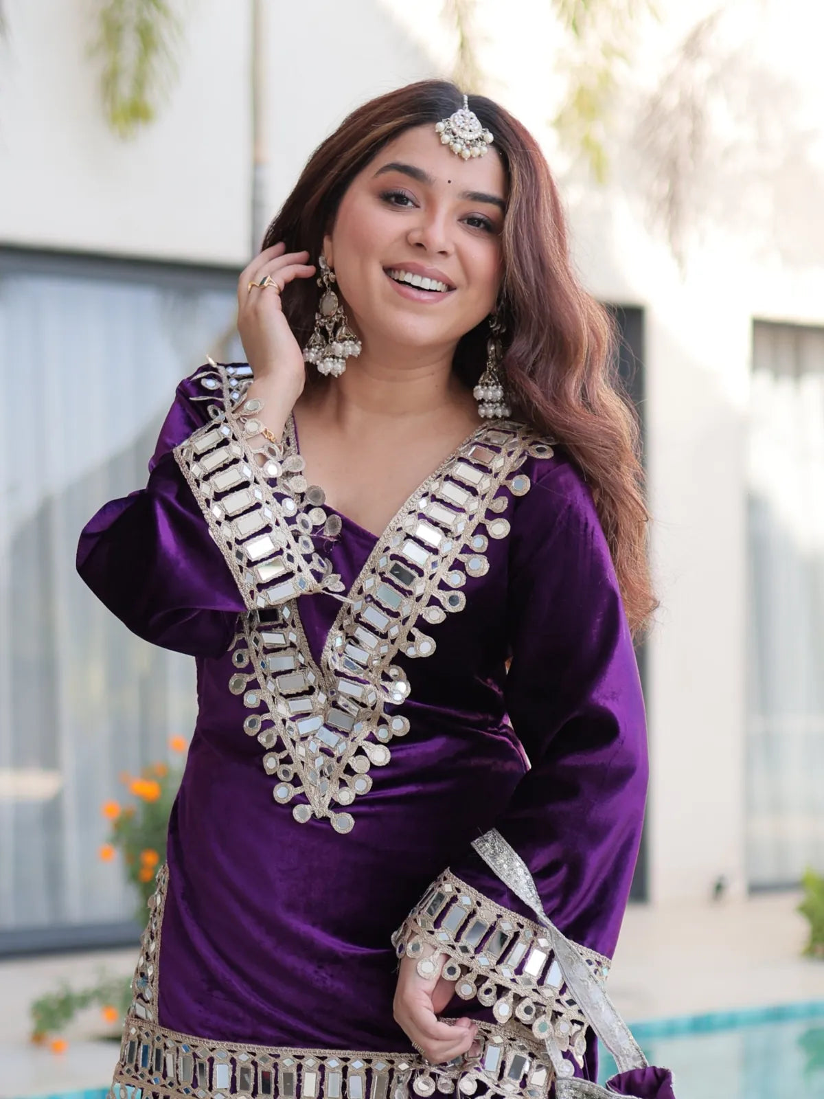 Tarani purple velvet dress upper-body view showing V neckline with real mirror embroidery
