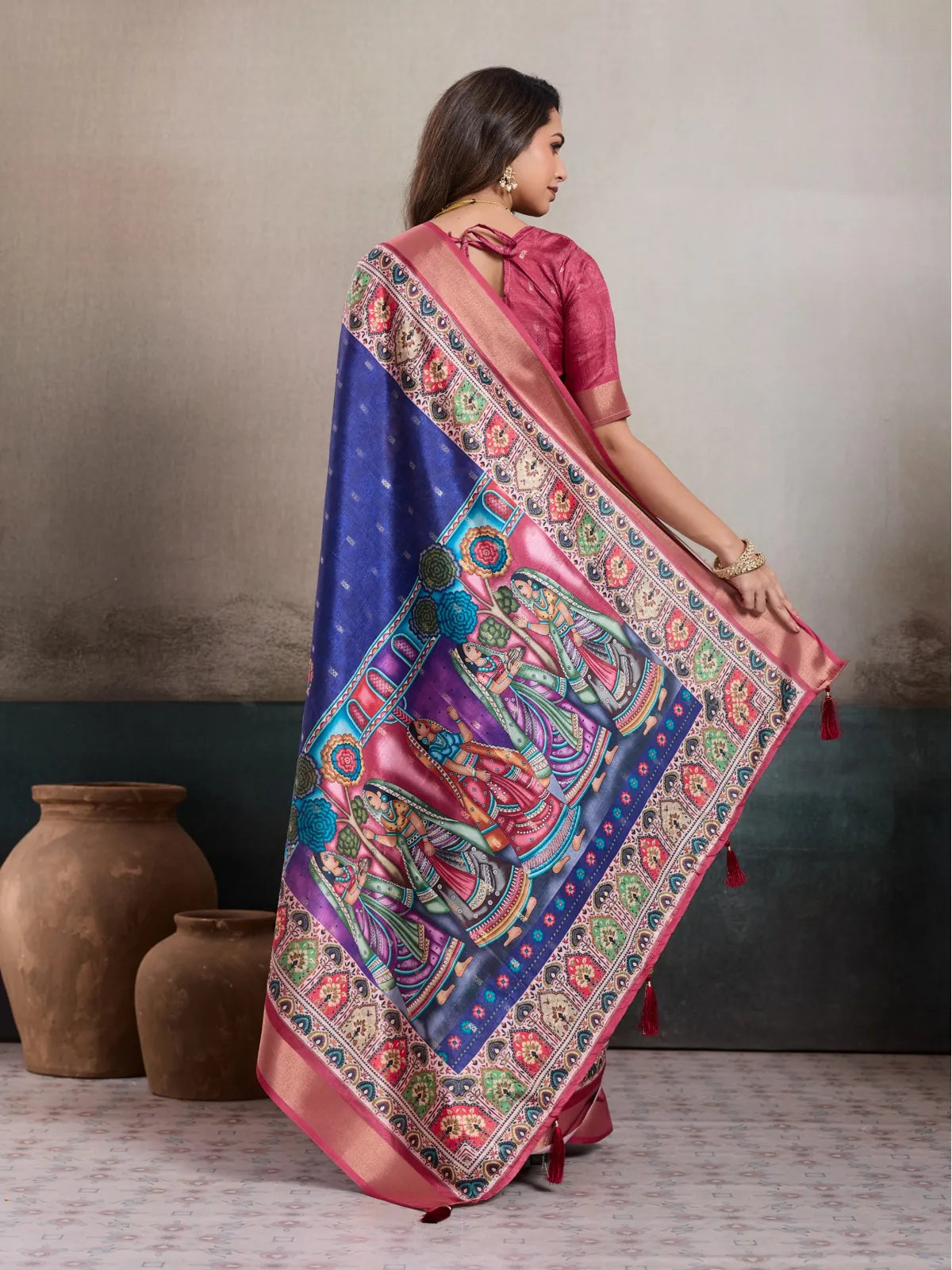 Tarani kalki silk saree back view with full pallu spread and beautiful contrast blouse