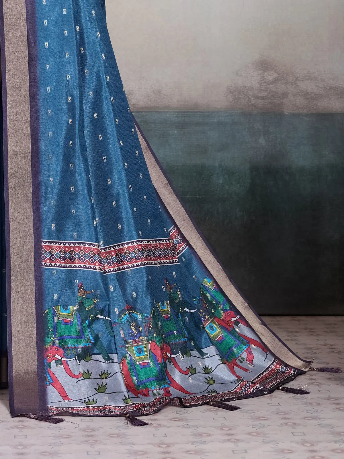 Tarani blue kalki silk saree pallu closeup showing digital elephant prints and border motifs