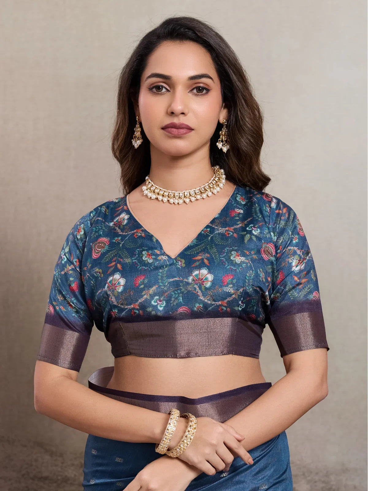 Tarani blue kalki silk saree upper body view with contrast printed blouse and zari sleeves