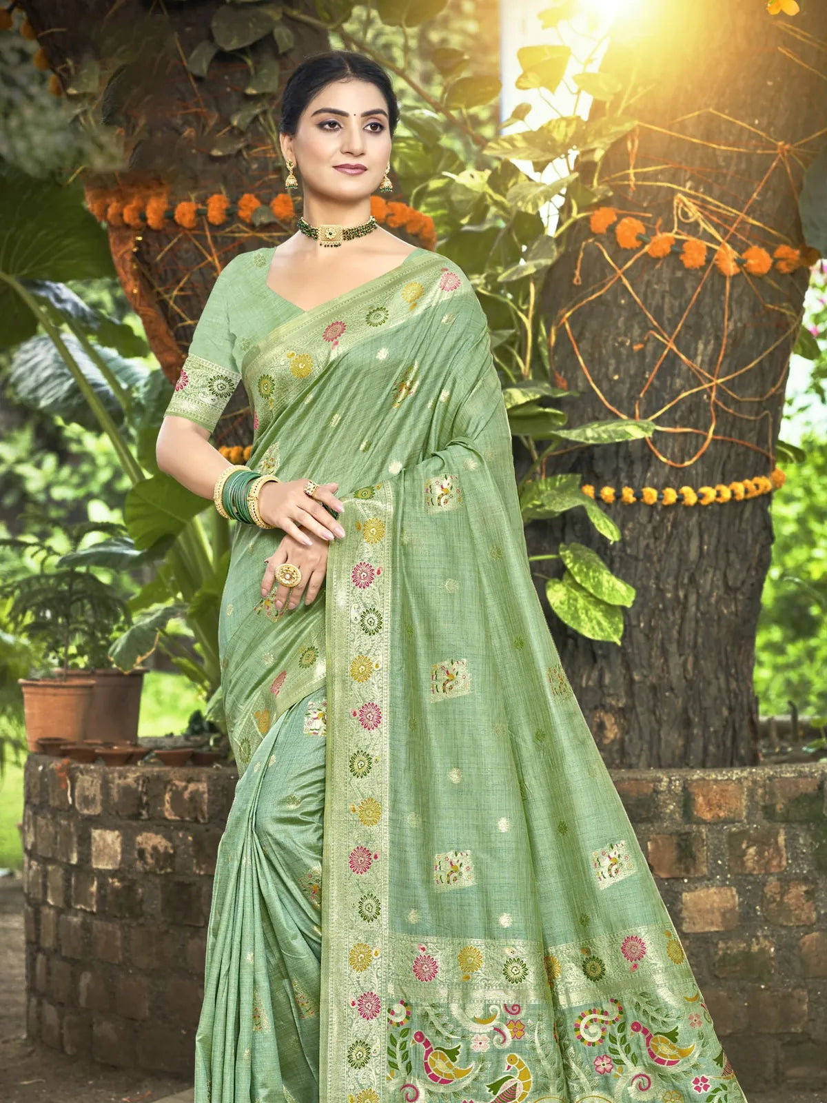 Tarani green Kanan silk saree full view with woven zari border and floral motifs