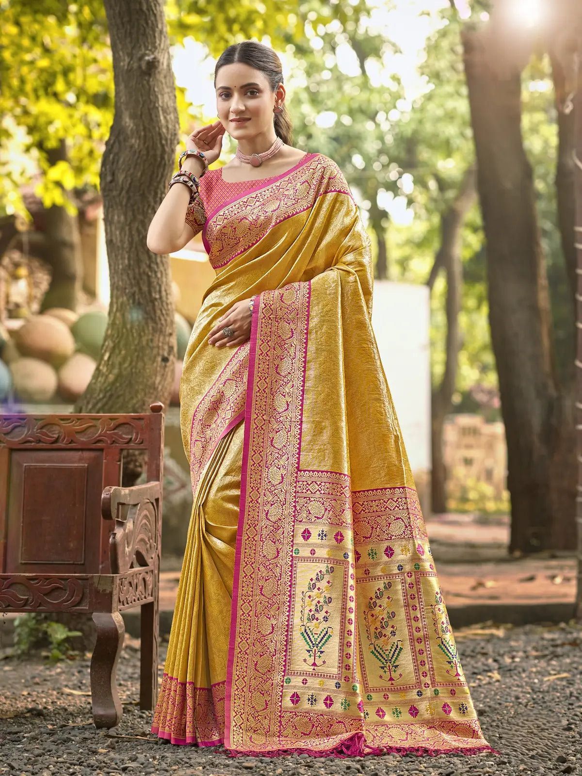Tarani yellow Kanjivaram silk saree full view with woven motifs and pink border