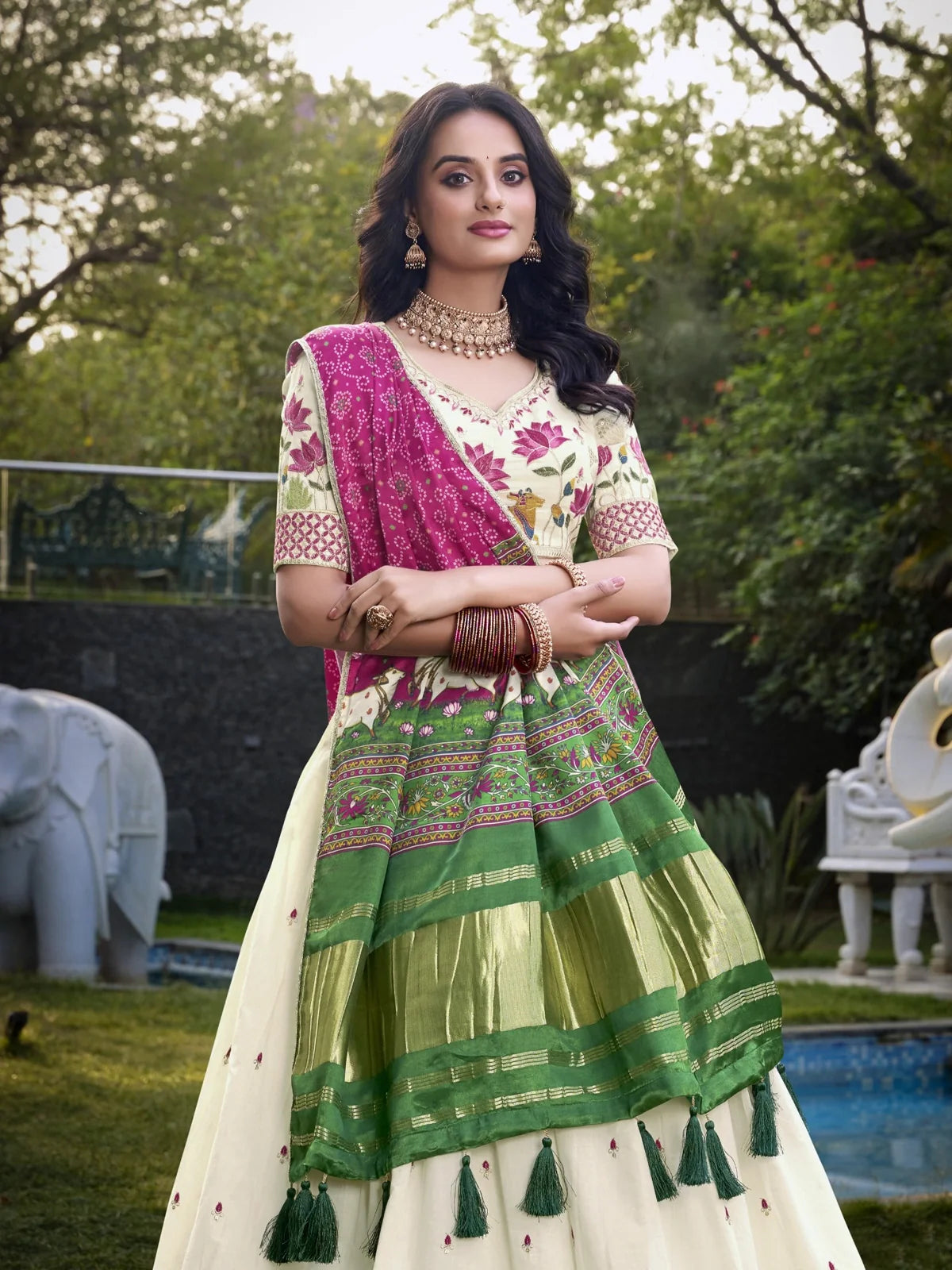 Tarani upper body view of cream khadi cotton lehenga with embroidered blouse and dupatta
